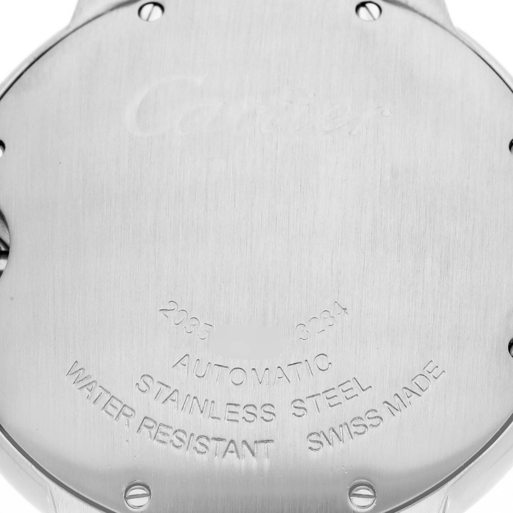 The image shows the back case of a Cartier Ballon Bleu W3BB0018 Men
s Steel and Gold (two tone) Silver Dial W3BB0018 Men
s Steel and Gold (two tone) Silver Dial watch, highlighting its stainless steel material and inscriptions.