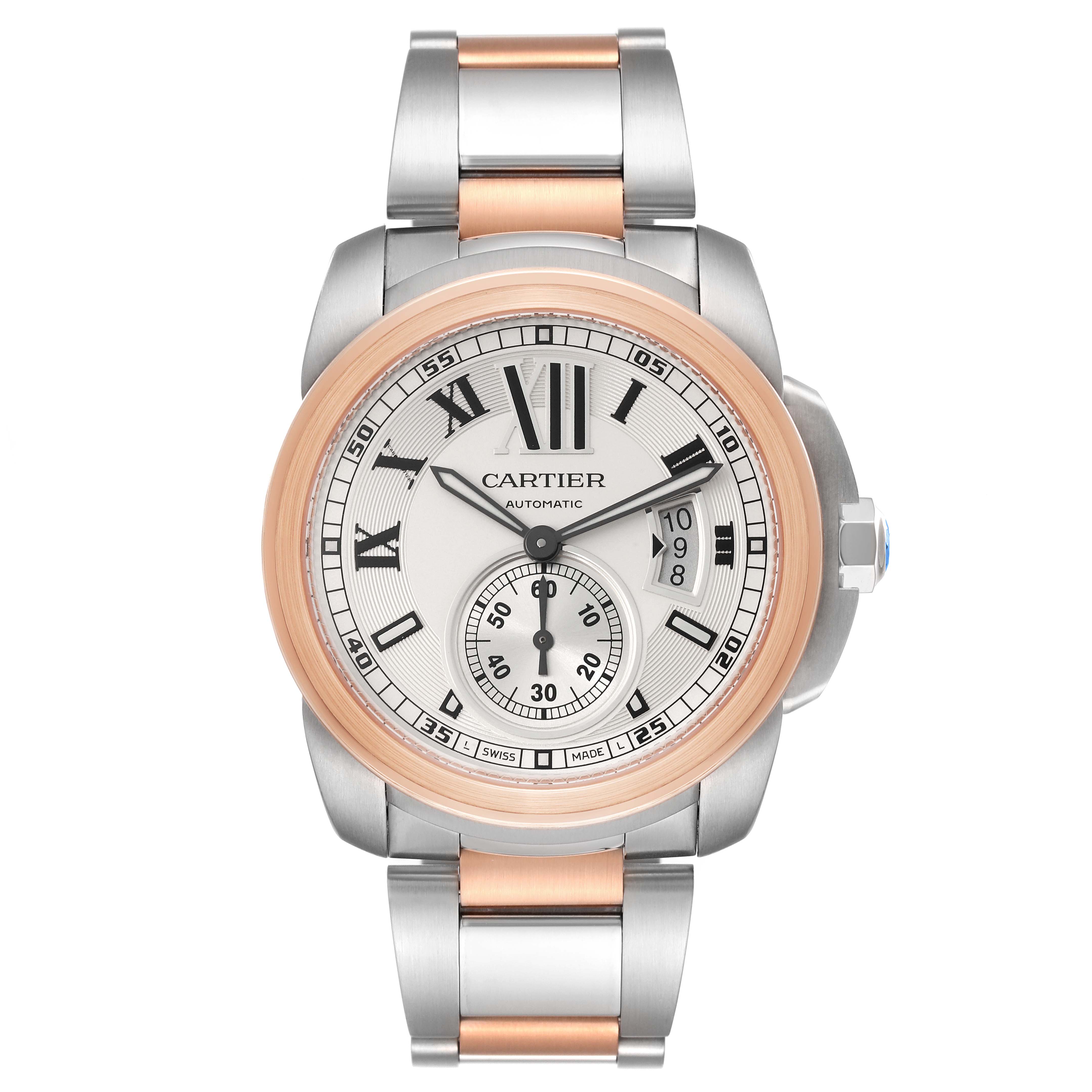 The image shows a front view of the Calibre de Cartier watch by Cartier, featuring the watch face and stainless steel bracelet with rose gold accents.