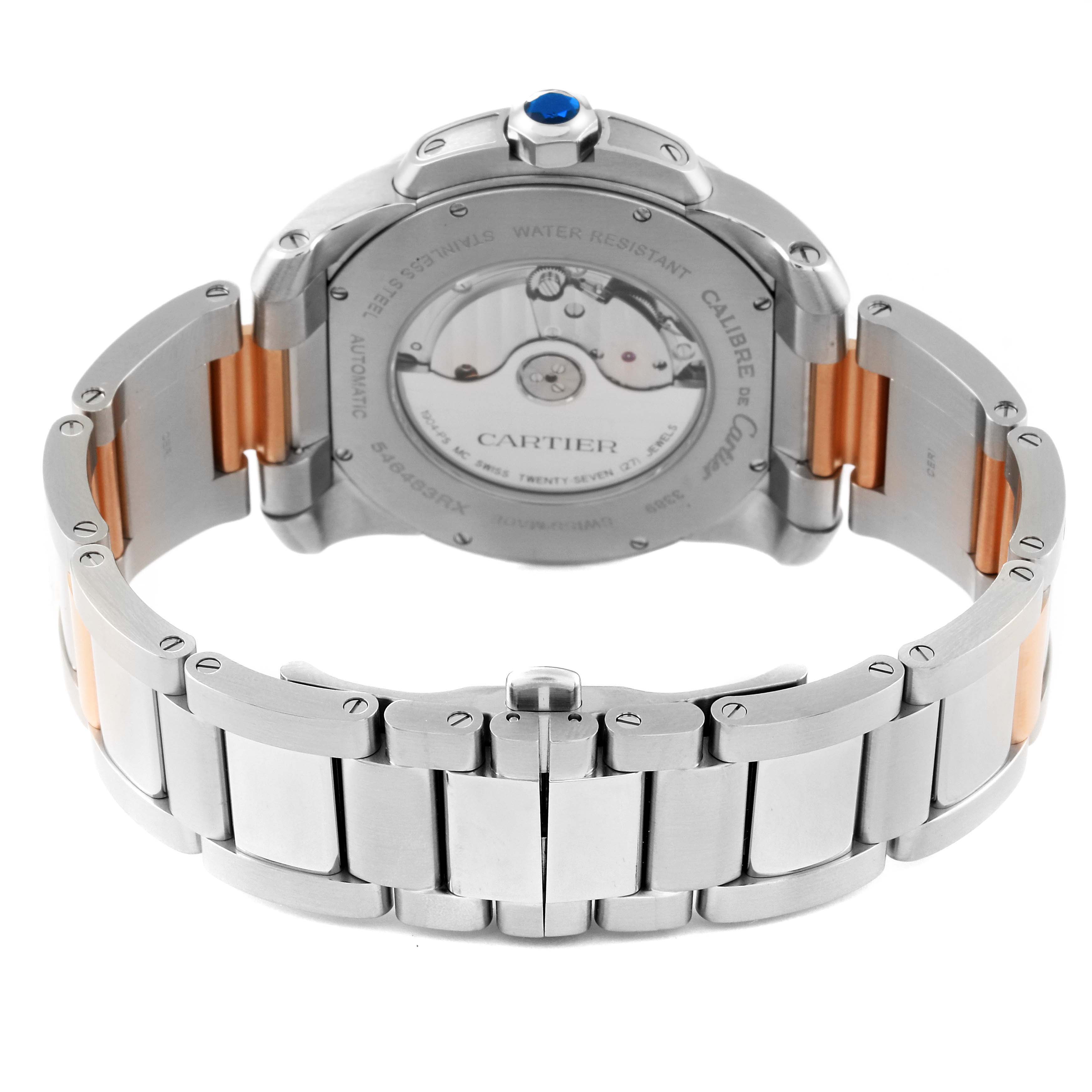 The image shows the back view of the Calibre de Cartier watch by Cartier, highlighting the bracelet and the transparent case back.