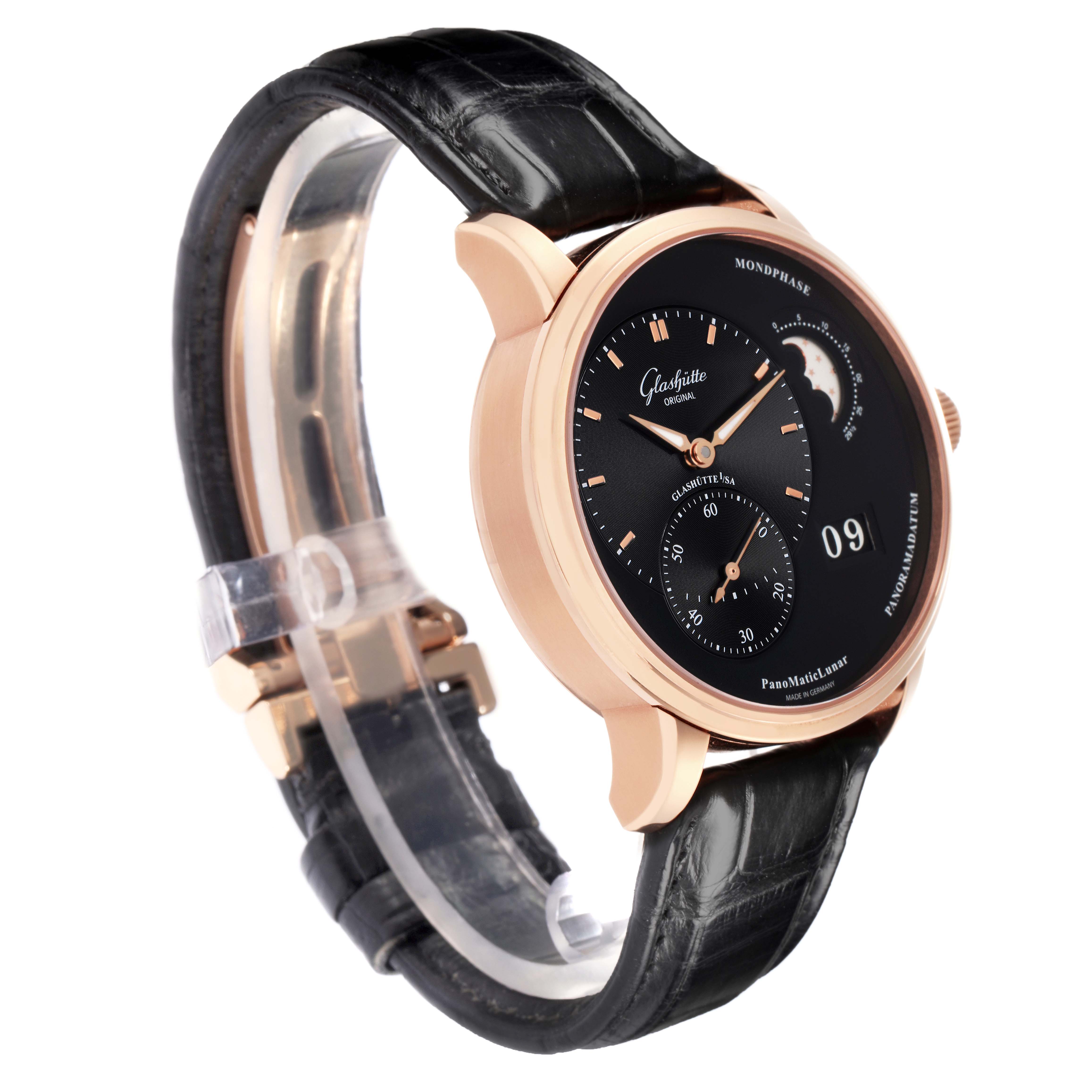 The Glashütte Pano watch is shown at an angled side view, highlighting the black dial, gold case, and leather strap.