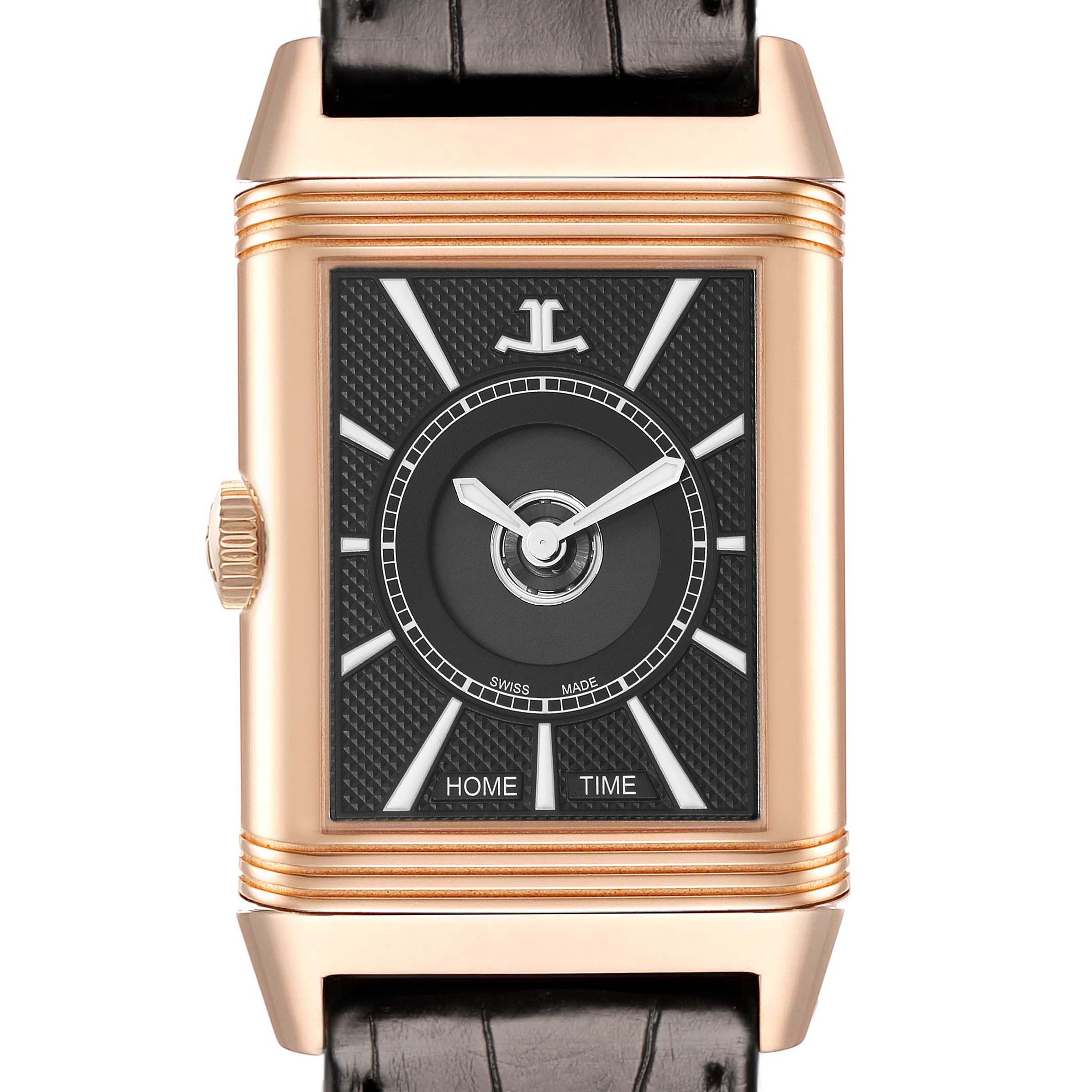 The Jaeger-LeCoultre Reverso watch is shown from the front, highlighting its rectangular face, dial details, and crown.