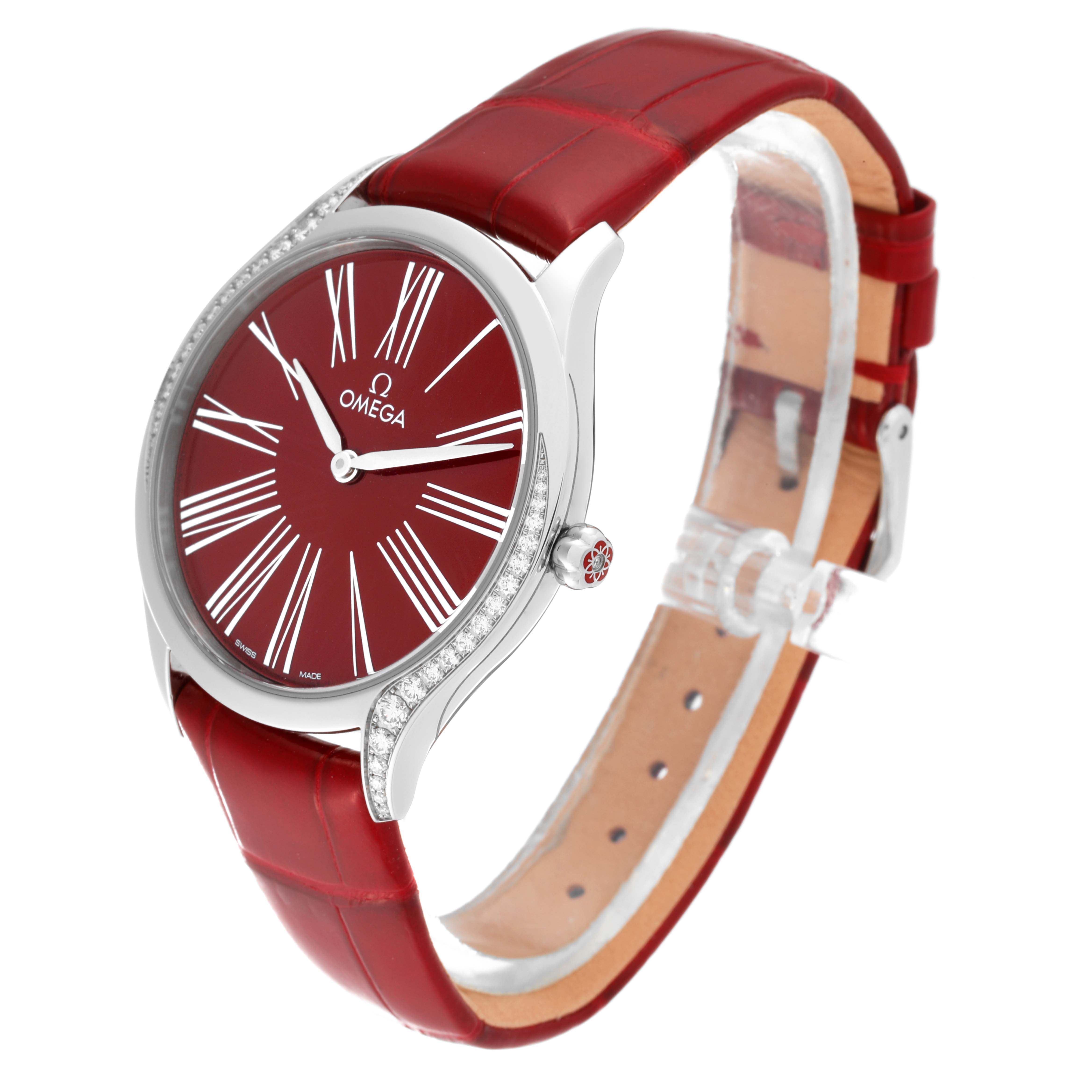 The Omega 428.18.36.60.11.002 Women's Stainless Steel Red Dial 428.18.36.60.11.002 Women's Stainless Steel Red Dial DeVille Tresor Diamond Red Dial Ladies Watch 428.18.36.60.11.002 is shown at a three-quarter angle, highlighting the dial, bezel, and strap.