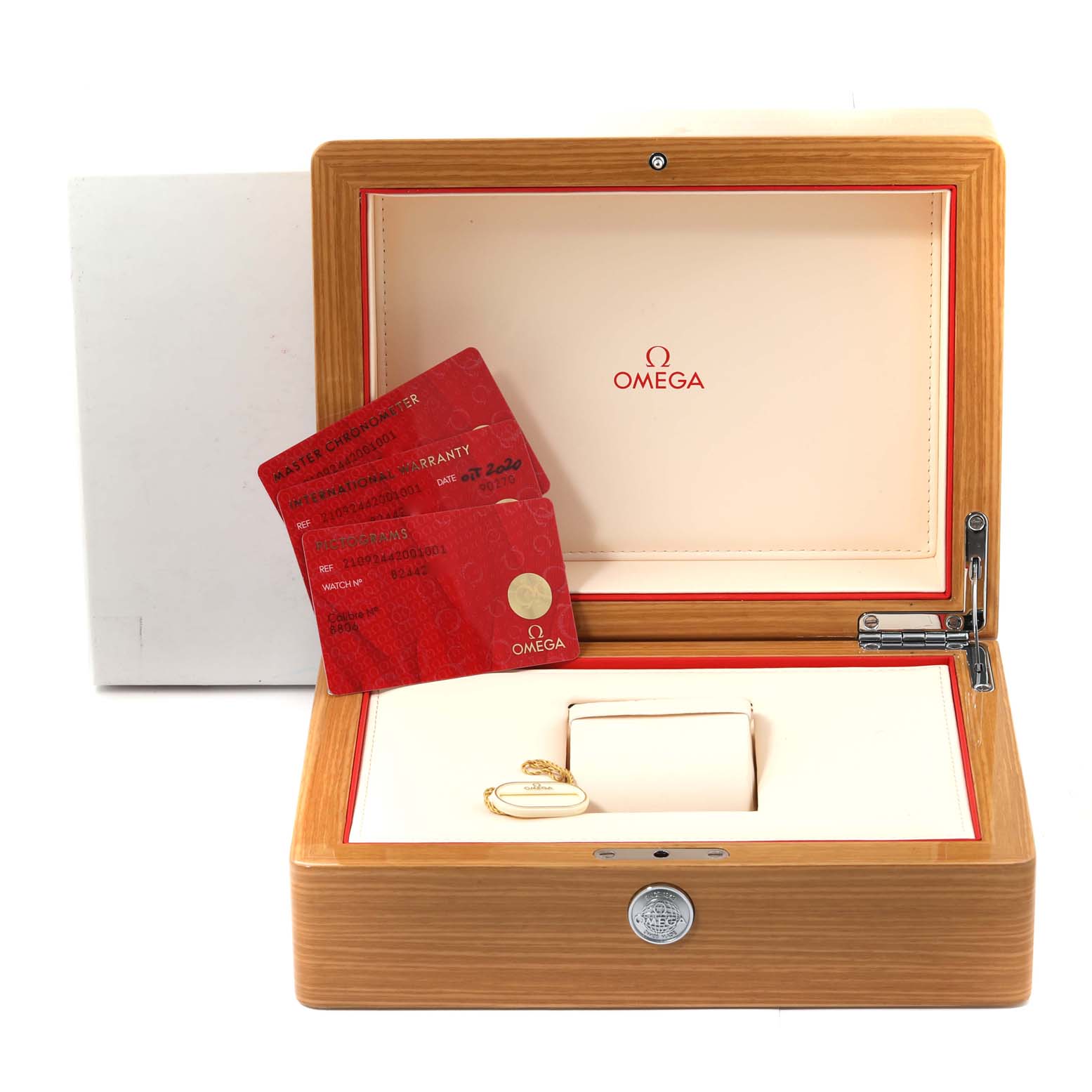 The image shows an Omega Seamaster 210.92.44.20.01.001 Men's Ceramic Black Dial 210.92.44.20.01.001 Men's Ceramic Black Dial watch box, warranty cards, and a key, photographed from the front.