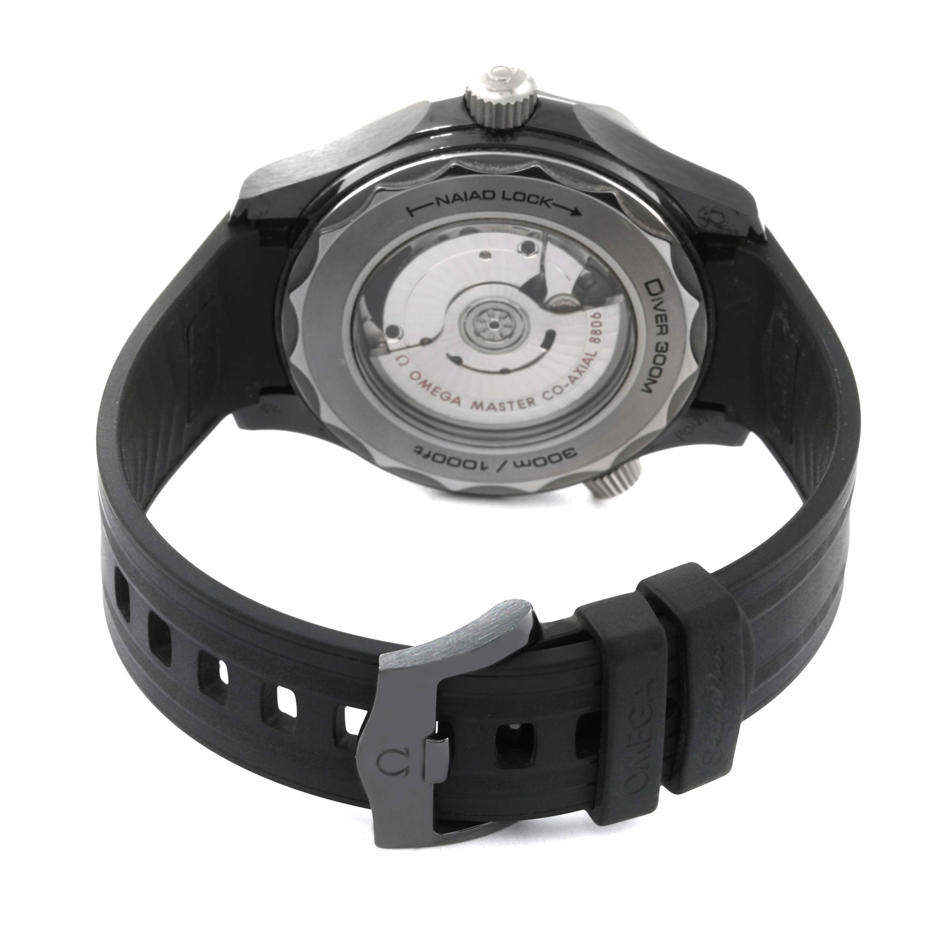 This image shows the back view of the Omega Seamaster 210.92.44.20.01.001 Men's Ceramic Black Dial 210.92.44.20.01.001 Men's Ceramic Black Dial watch, highlighting its Naiad Lock, mechanism, and rubber strap.