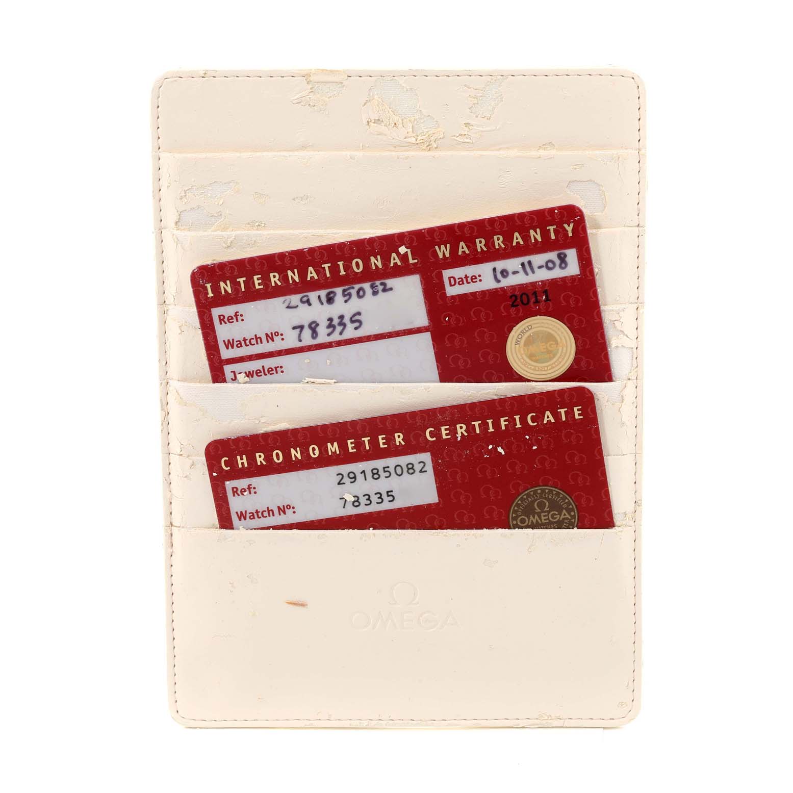 The image shows warranty and chronometer certificate cards for an Omega Planet Ocean 2918.50.82 Men's Stainless Steel Black Dial 2918.50.82 Men's Stainless Steel Black Dial watch in a white cardholder.