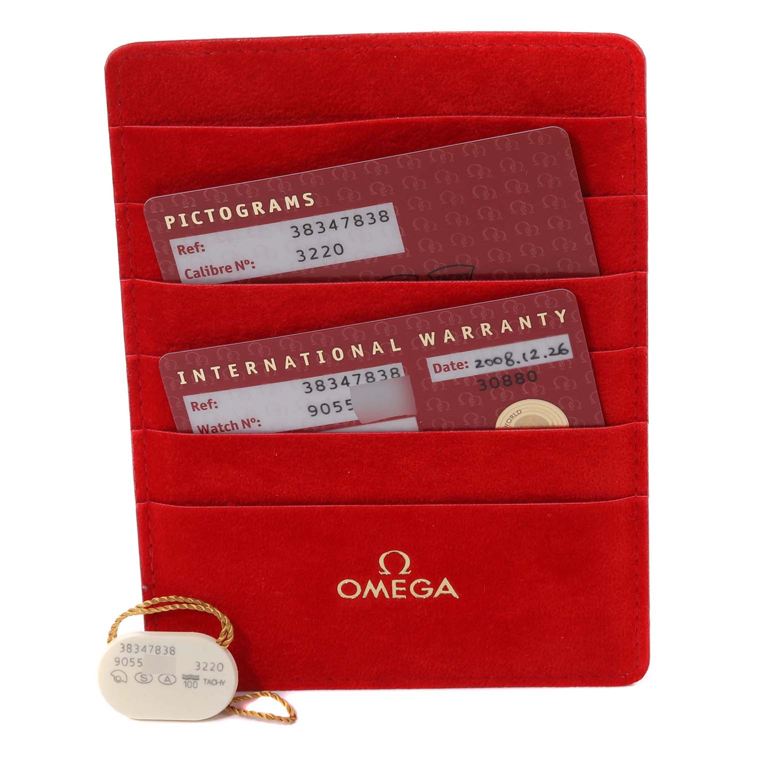 This image displays warranty and pictogram cards in a red Omega sleeve, and a tag with details for the Omega Speedmaster 3834.78.38 Men's Stainless Steel Mother of Pearl Dial 3834.78.38 Men's Stainless Steel Mother of Pearl Dial watch.