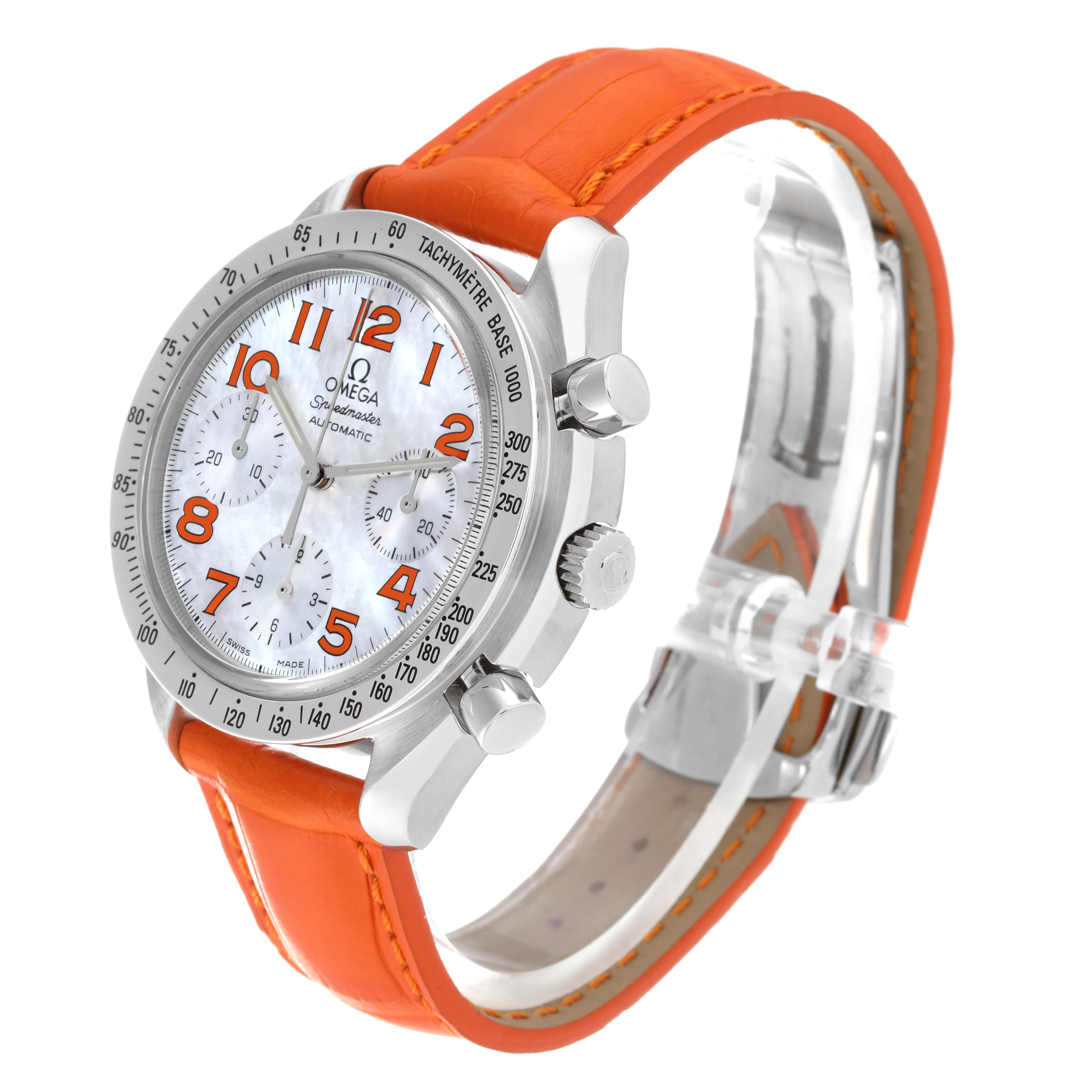 The image shows a right-side angle of the Omega Speedmaster 3834.78.38 Men's Stainless Steel Mother of Pearl Dial 3834.78.38 Men's Stainless Steel Mother of Pearl Dial watch, highlighting its orange strap, crown, and pushers.