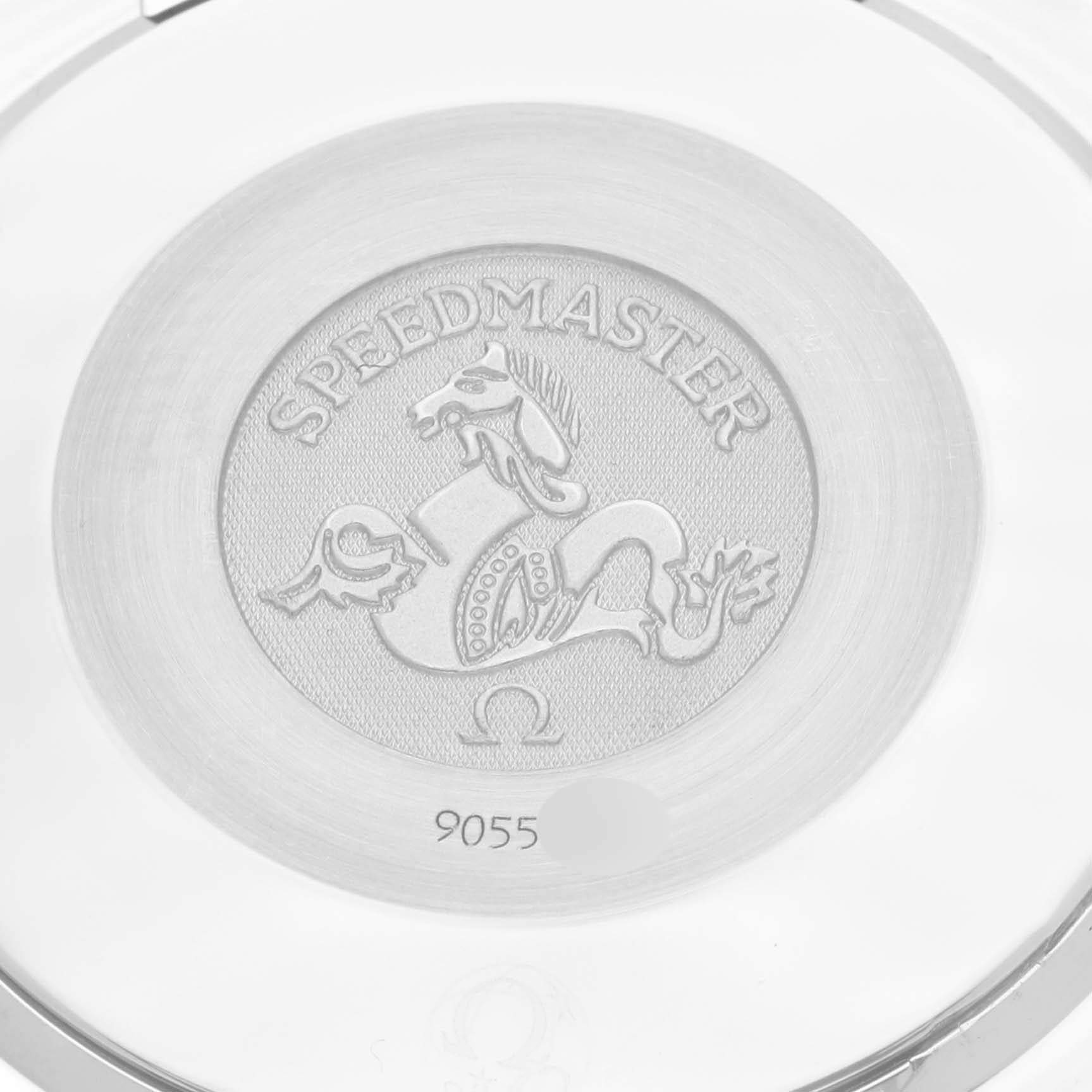 The image shows the case back of an Omega Speedmaster 3834.78.38 Men's Stainless Steel Mother of Pearl Dial 3834.78.38 Men's Stainless Steel Mother of Pearl Dial watch, featuring the Speedmaster logo and model number 9055.