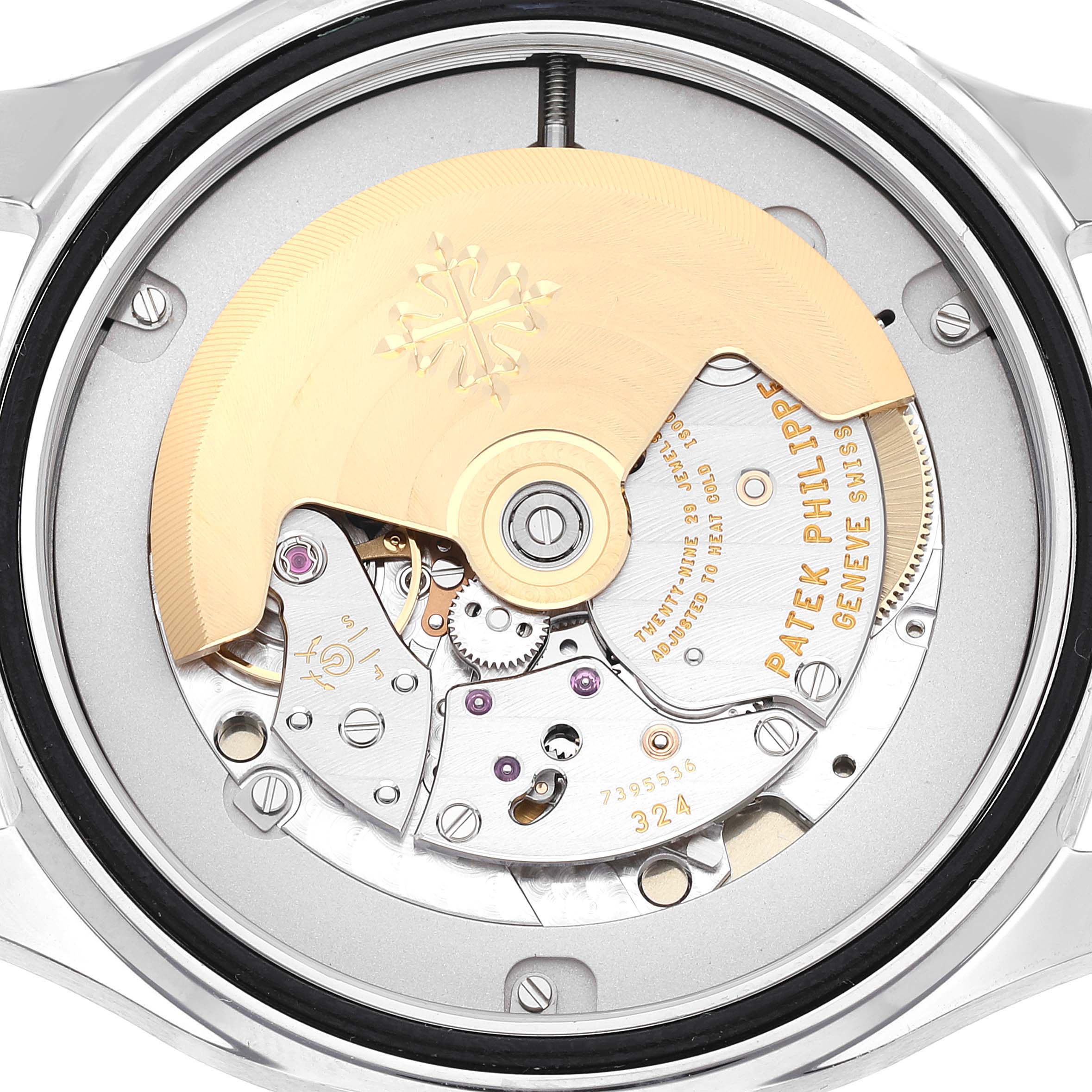 The image shows the back view of a Patek Philippe Aquanaut 5167A Men's Stainless Steel Black Dial 5167A Men's Stainless Steel Black Dial watch, displaying its intricate movement and rotor.