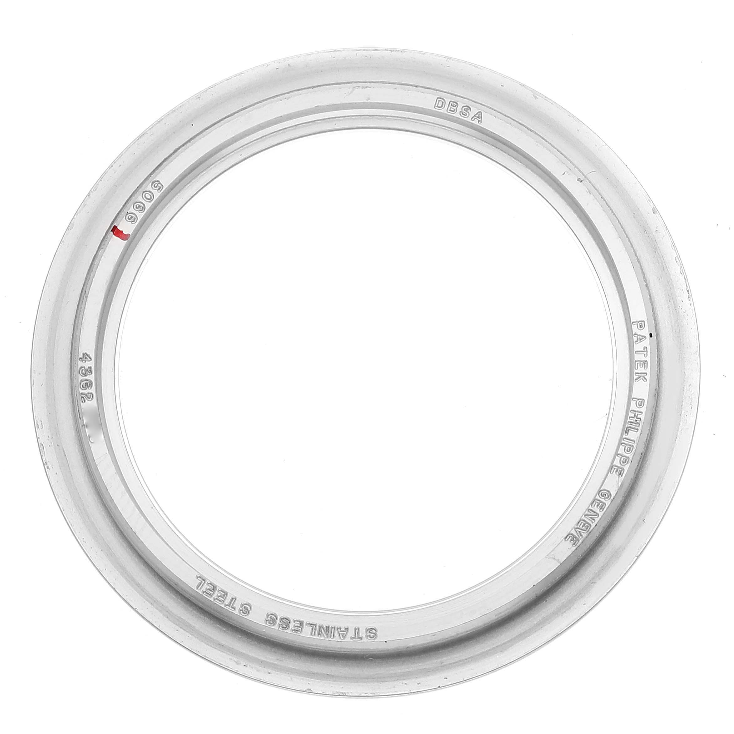 The image shows a stainless steel bezel for the Patek Philippe Aquanaut 5066A Men's Stainless Steel Black Dial 5066A Men's Stainless Steel Black Dial model, viewed from above.