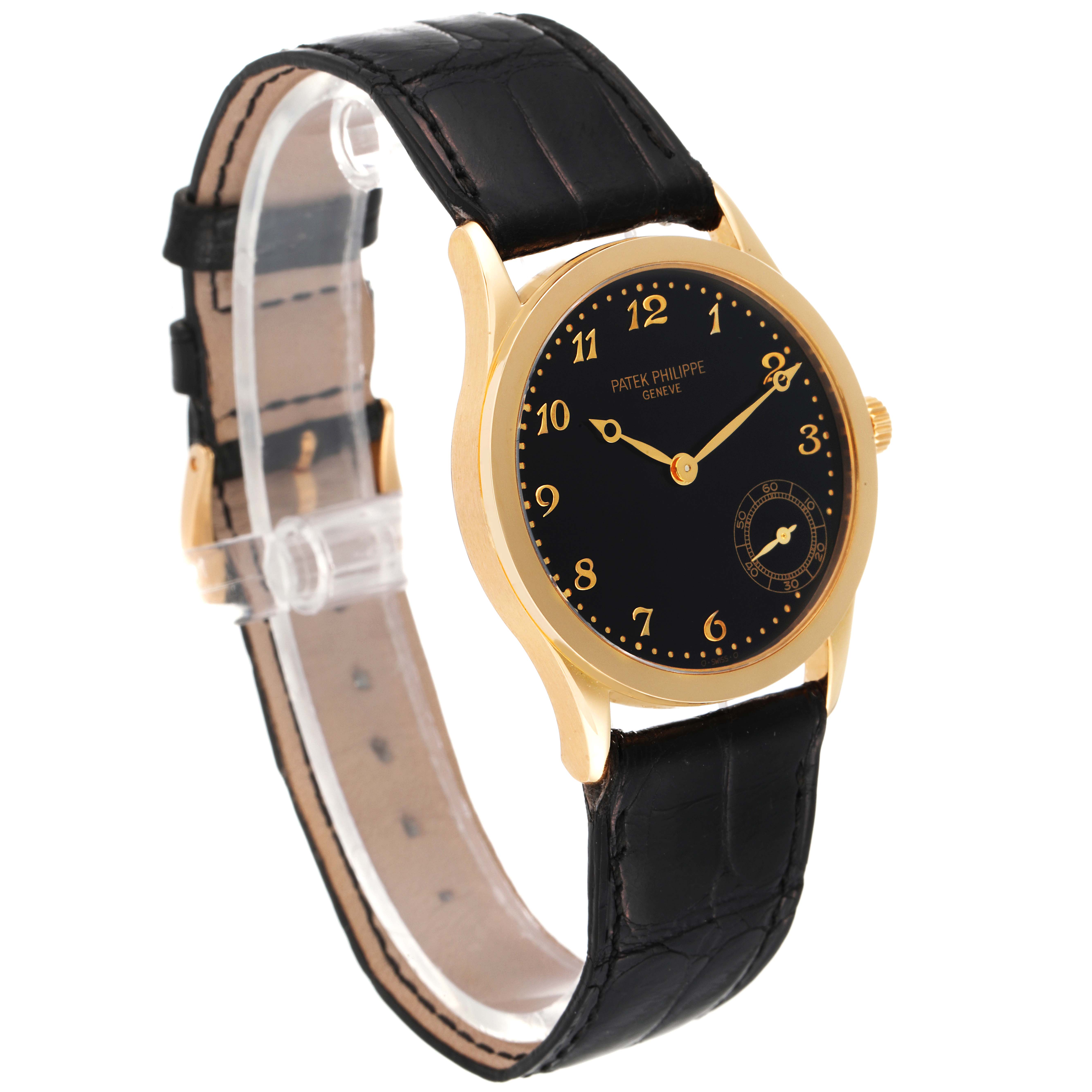 The image shows a Patek Philippe Calatrava 5026J Men's Yellow Gold Black Dial 5026J Men's Yellow Gold Black Dial watch at a three-quarter angle, displaying the watch face, crown, and leather strap.