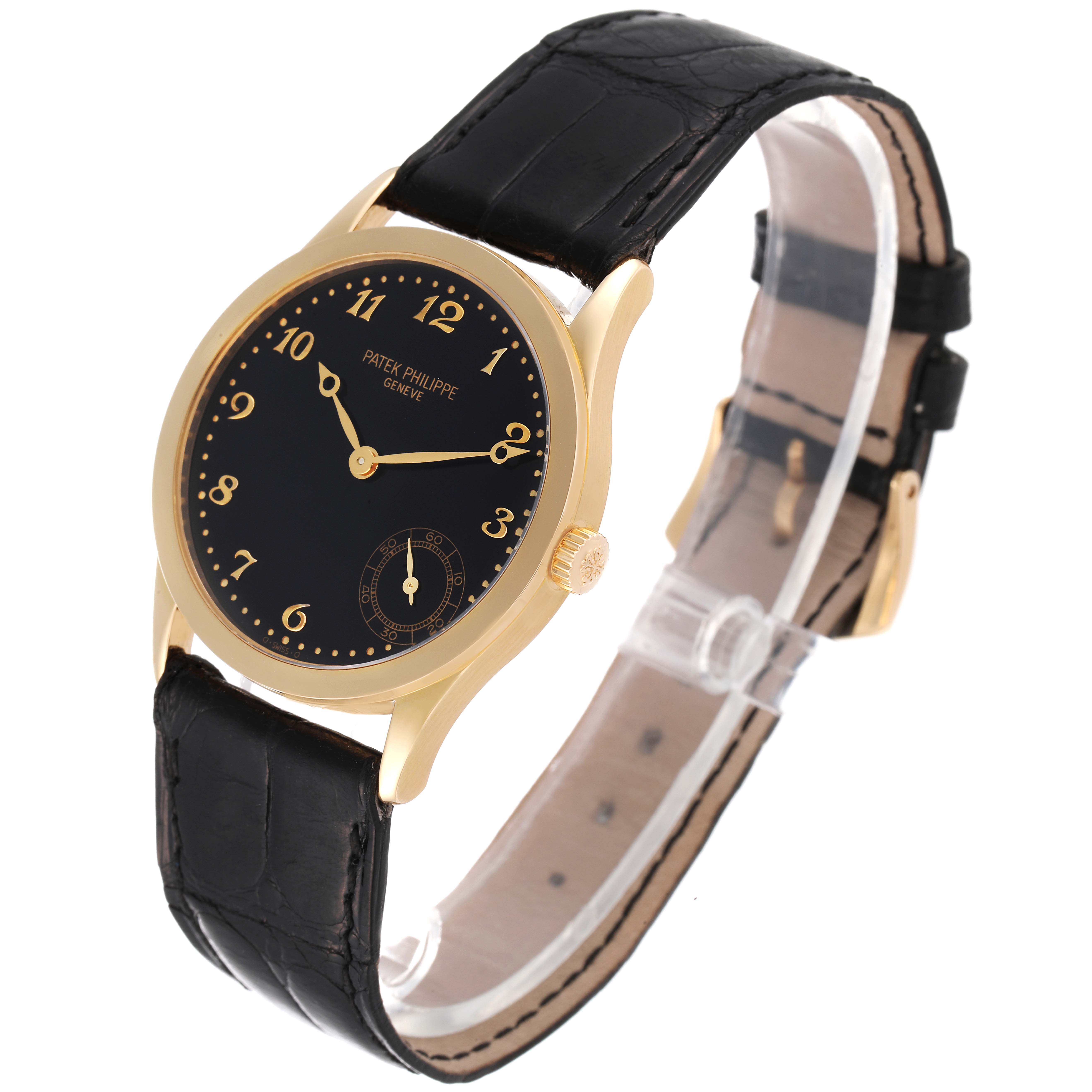 The image shows a Patek Philippe Calatrava 5026J Men's Yellow Gold Black Dial 5026J Men's Yellow Gold Black Dial watch at a front-side angle, displaying the face, straps, and crown.