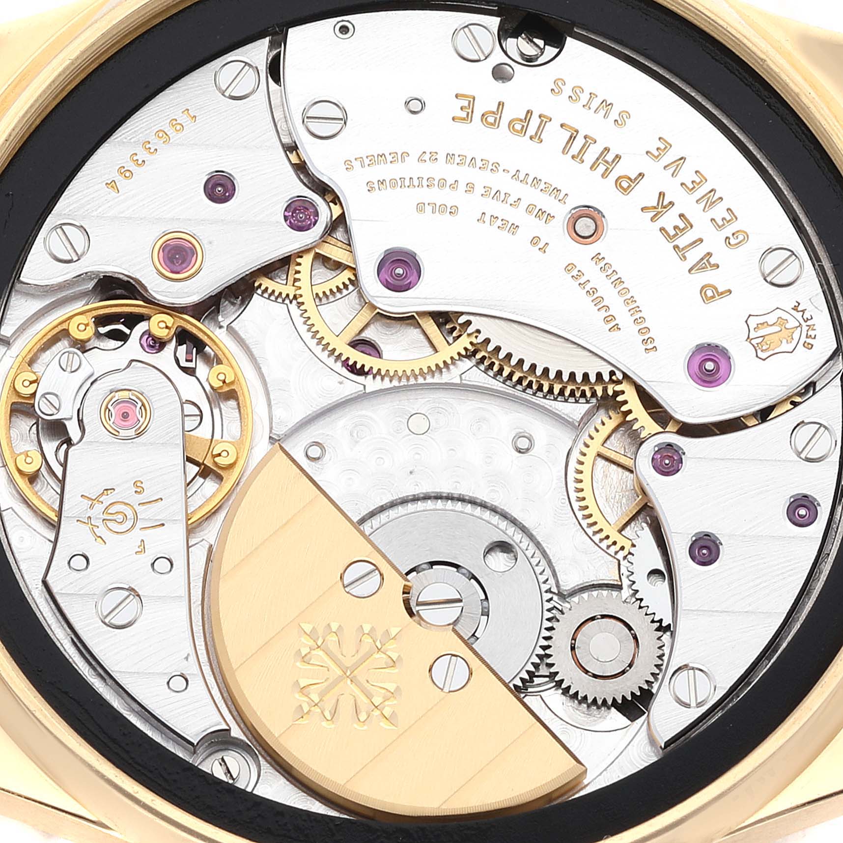 This image shows the intricate movement and internal components of the Patek Philippe Calatrava 5026J Men's Yellow Gold Black Dial 5026J Men's Yellow Gold Black Dial watch from a back angle.