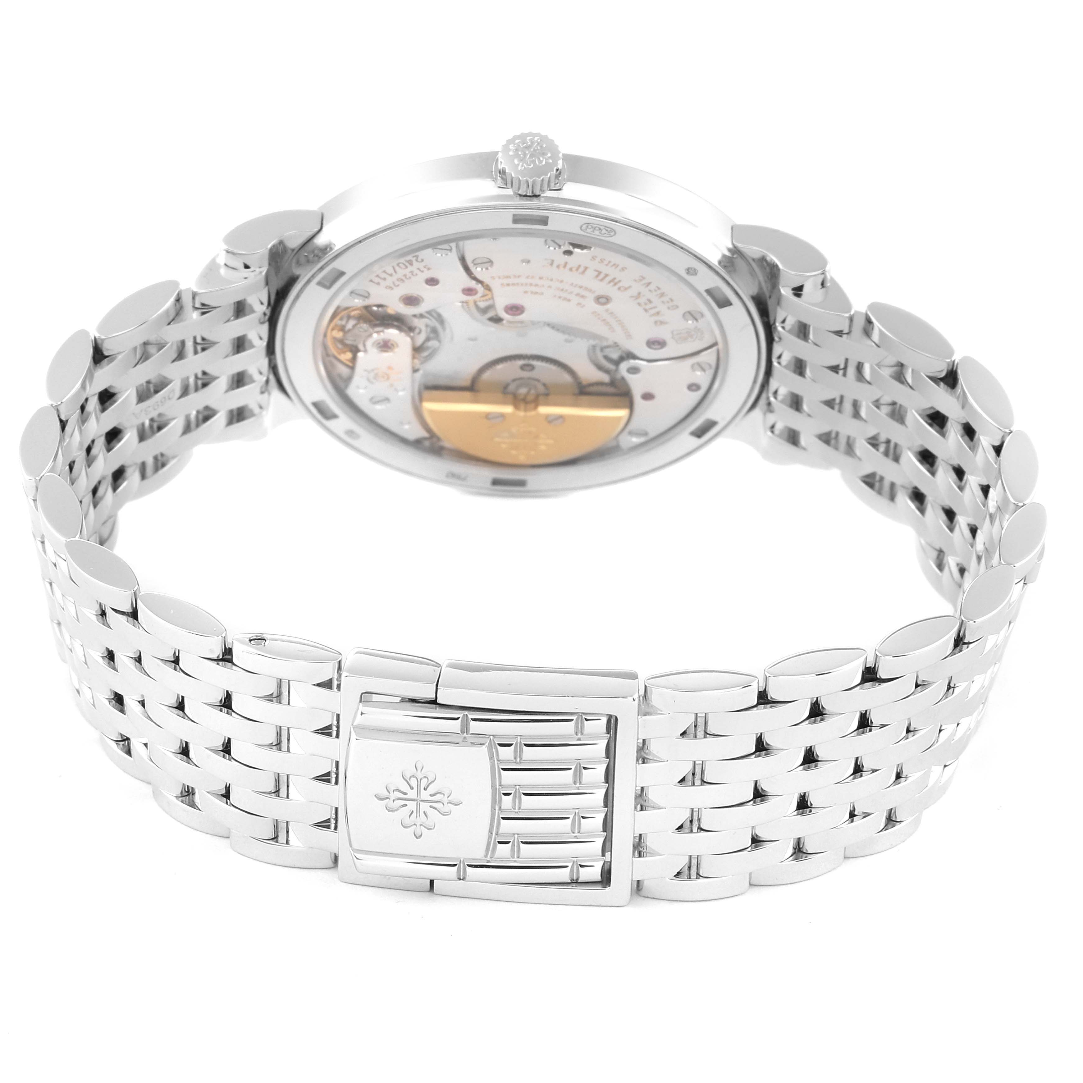 The image shows the back view of the Patek Philippe Calatrava 5120/1G-001 Men's White Gold Silver Dial 5120/1G-001 Men's White Gold Silver Dial watch, highlighting the movement and bracelet.