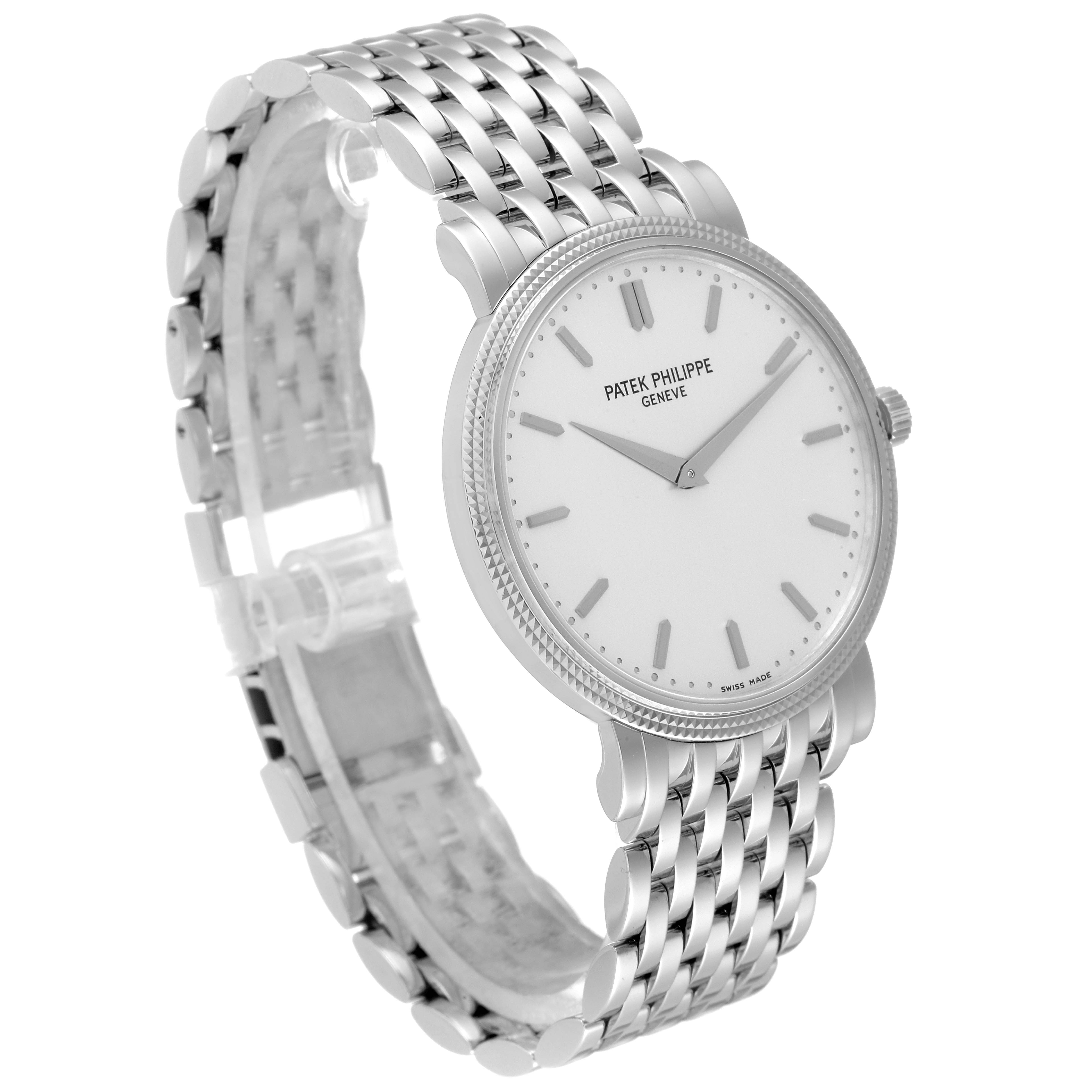 The image shows a three-quarter view of the Patek Philippe Calatrava 5120/1G-001 Men's White Gold Silver Dial 5120/1G-001 Men's White Gold Silver Dial watch, highlighting its face, bezel, and metal bracelet.