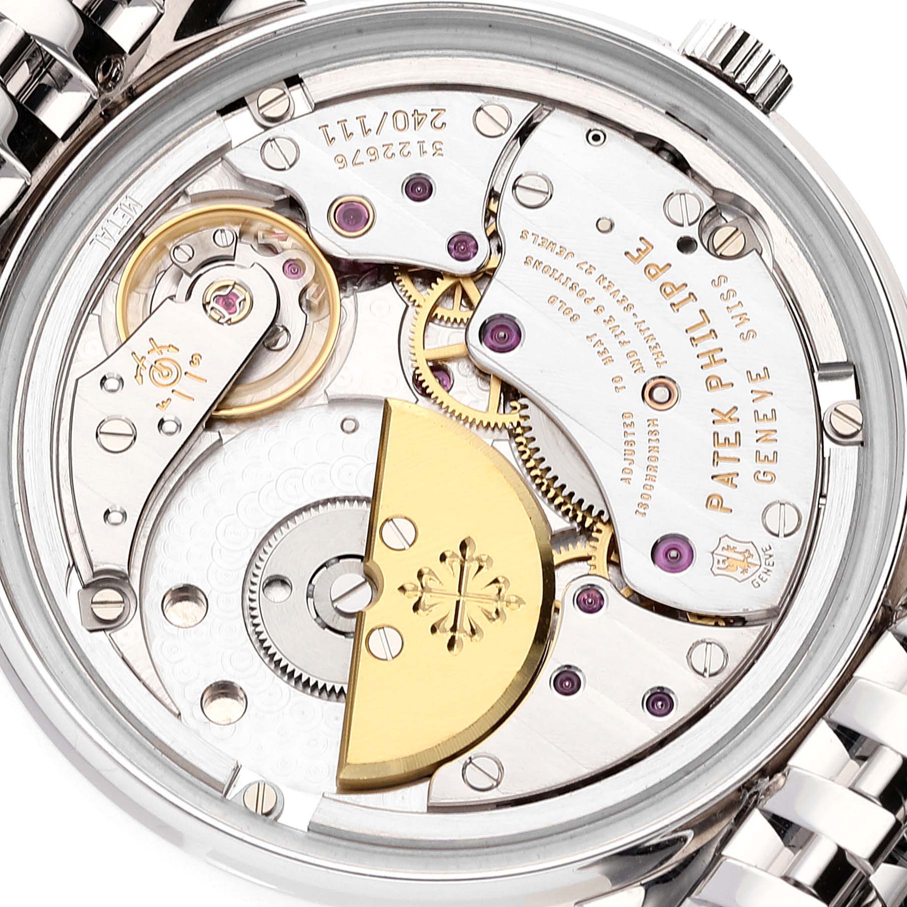 The image shows the back view of the Patek Philippe Calatrava 5120/1G-001 Men's White Gold Silver Dial 5120/1G-001 Men's White Gold Silver Dial model, highlighting the intricate mechanical movement.