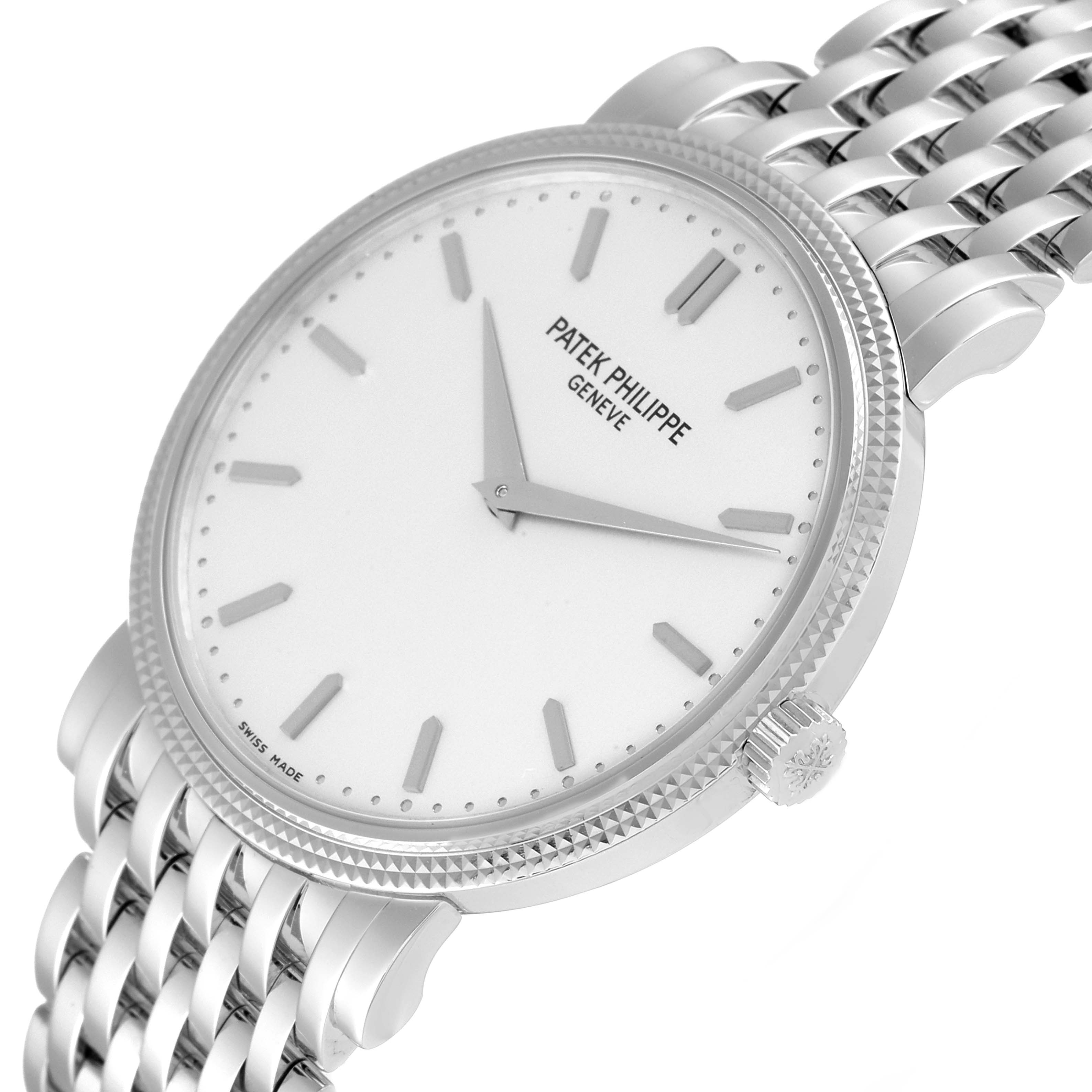 The image is a close-up angled view of the dial and bracelet of a Patek Philippe Calatrava 5120/1G-001 Men's White Gold Silver Dial 5120/1G-001 Men's White Gold Silver Dial watch.