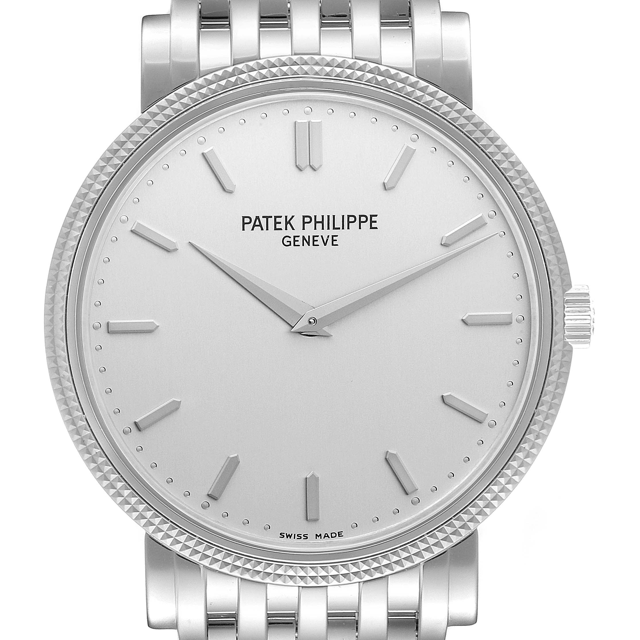 This image displays a close-up of the dial, crown, and part of the bracelet of the Patek Philippe Calatrava 5120/1G-001 Men's White Gold Silver Dial 5120/1G-001 Men's White Gold Silver Dial watch.