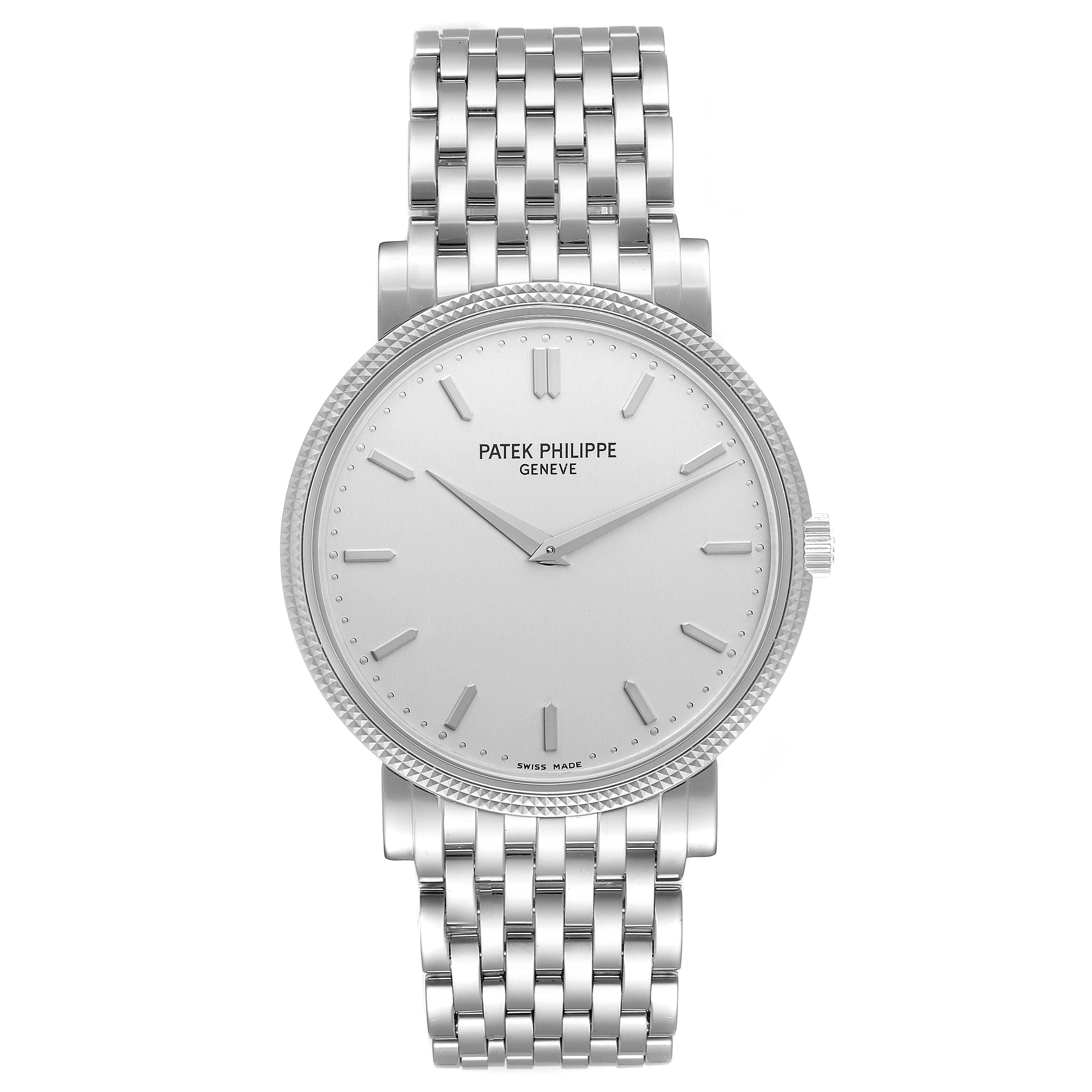 The image shows a front view of the Patek Philippe Calatrava 5120/1G-001 Men's White Gold Silver Dial 5120/1G-001 Men's White Gold Silver Dial watch, featuring its face and metal bracelet.
