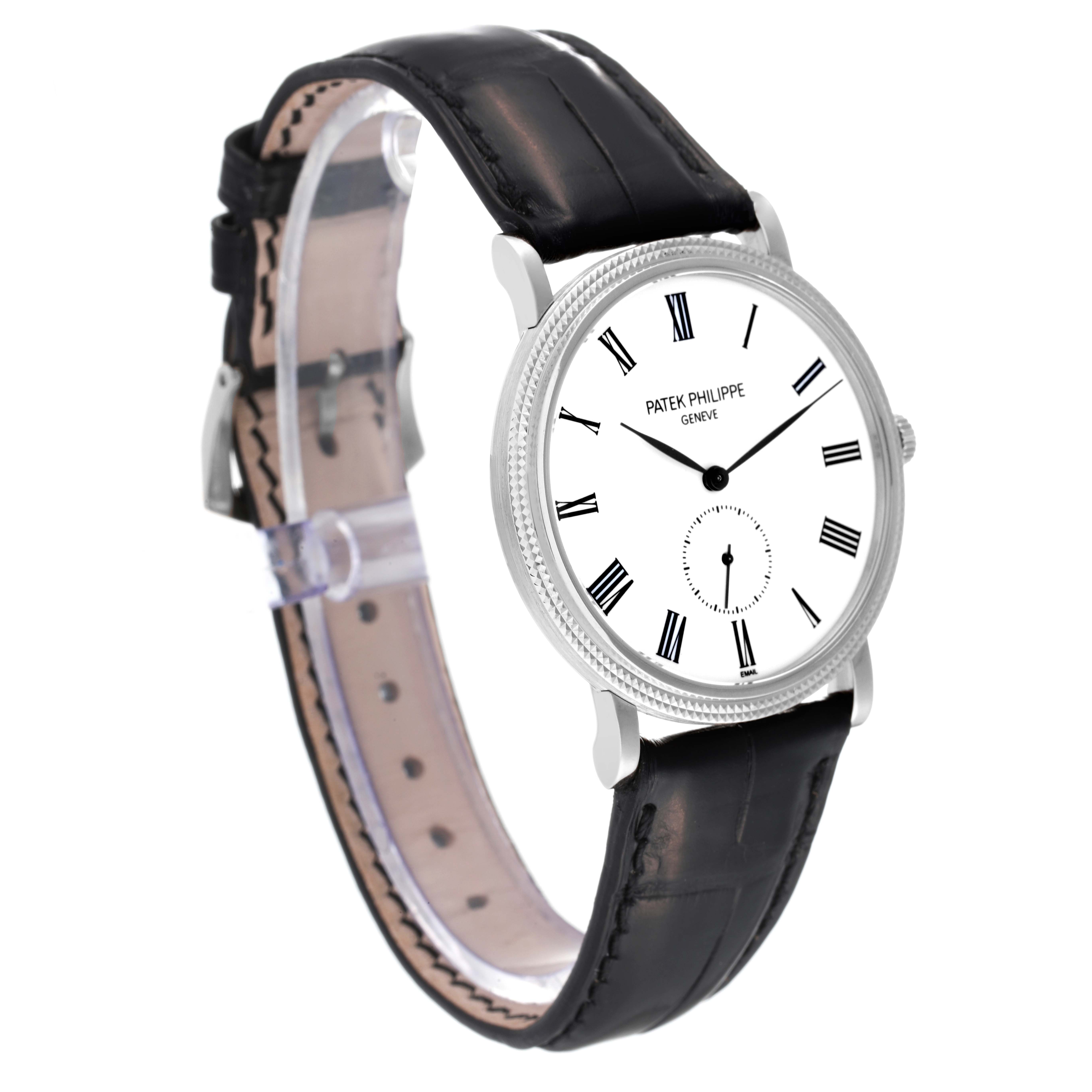 This image shows a side angle of the Patek Philippe Calatrava 5116G Men's White Gold White Dial 5116G Men's White Gold White Dial watch, featuring its face, bezel, and leather strap.
