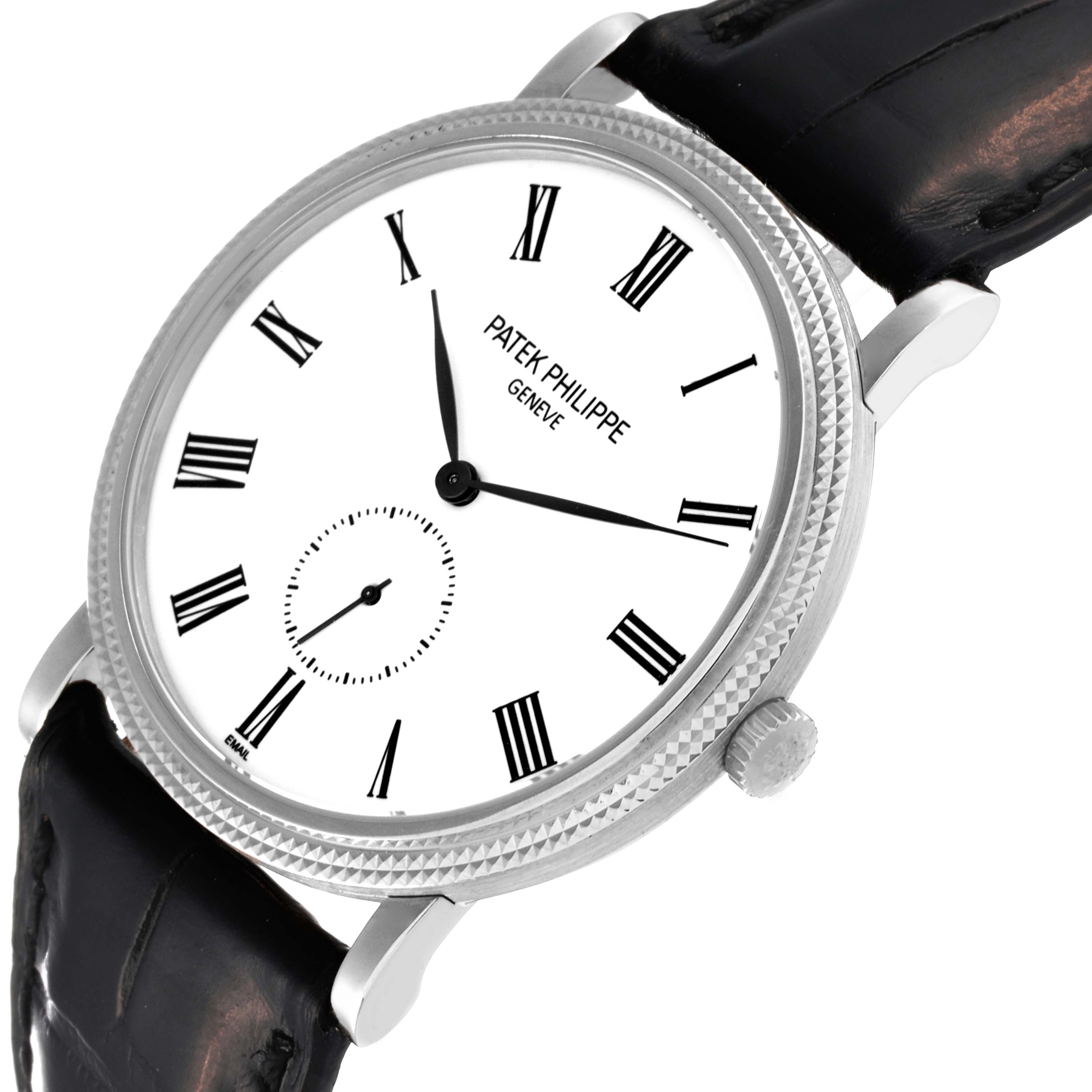 The image shows a close-up of a Patek Philippe Calatrava 5116G Men's White Gold White Dial 5116G Men's White Gold White Dial watch, displaying the face, bezel, and part of the strap at an angled view.