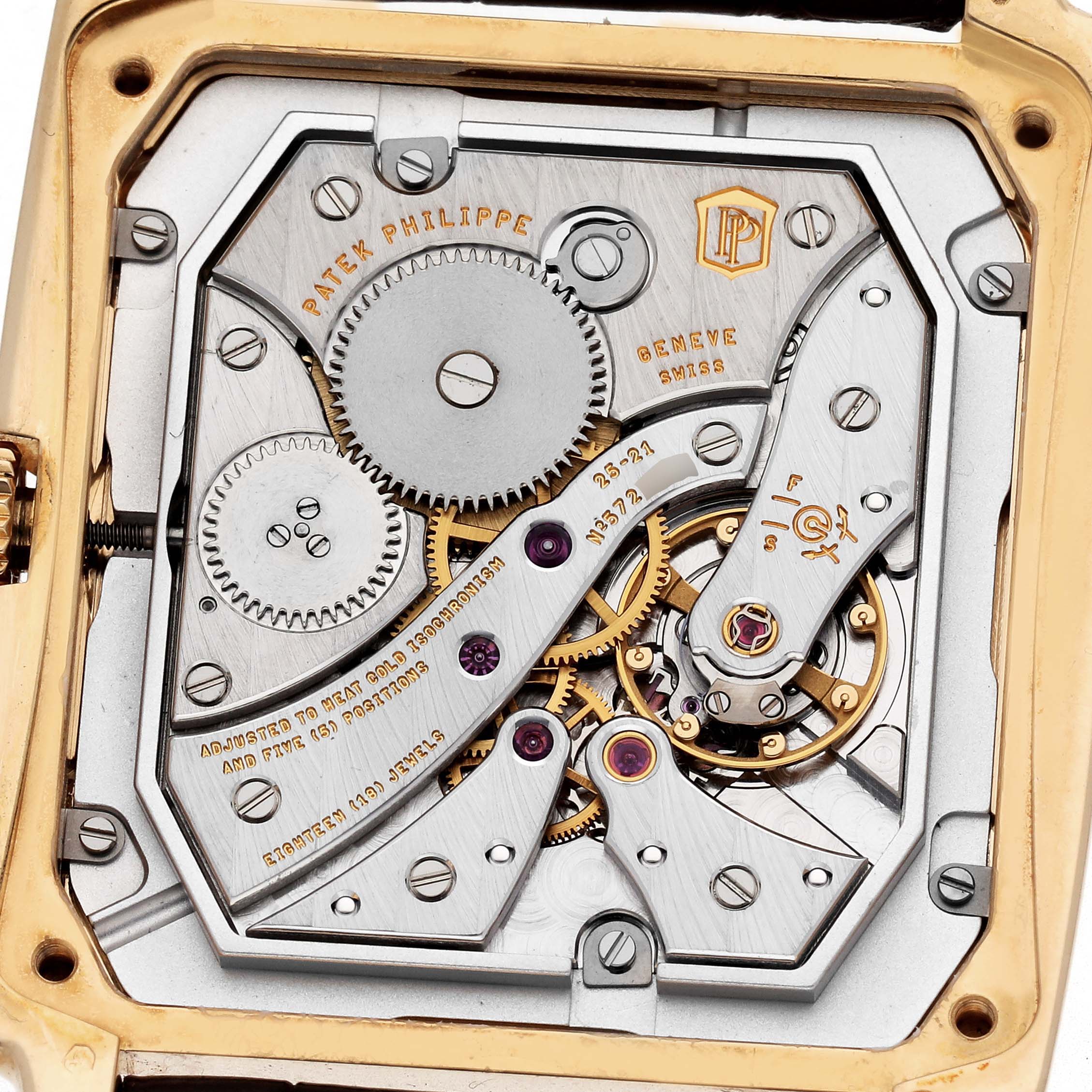 The image shows the back view of a Patek Philippe Gondolo 5124J-001 Men
s Yellow Gold Silver Dial 5124J-001 Men
s Yellow Gold Silver Dial watch, highlighting its intricate internal movement.