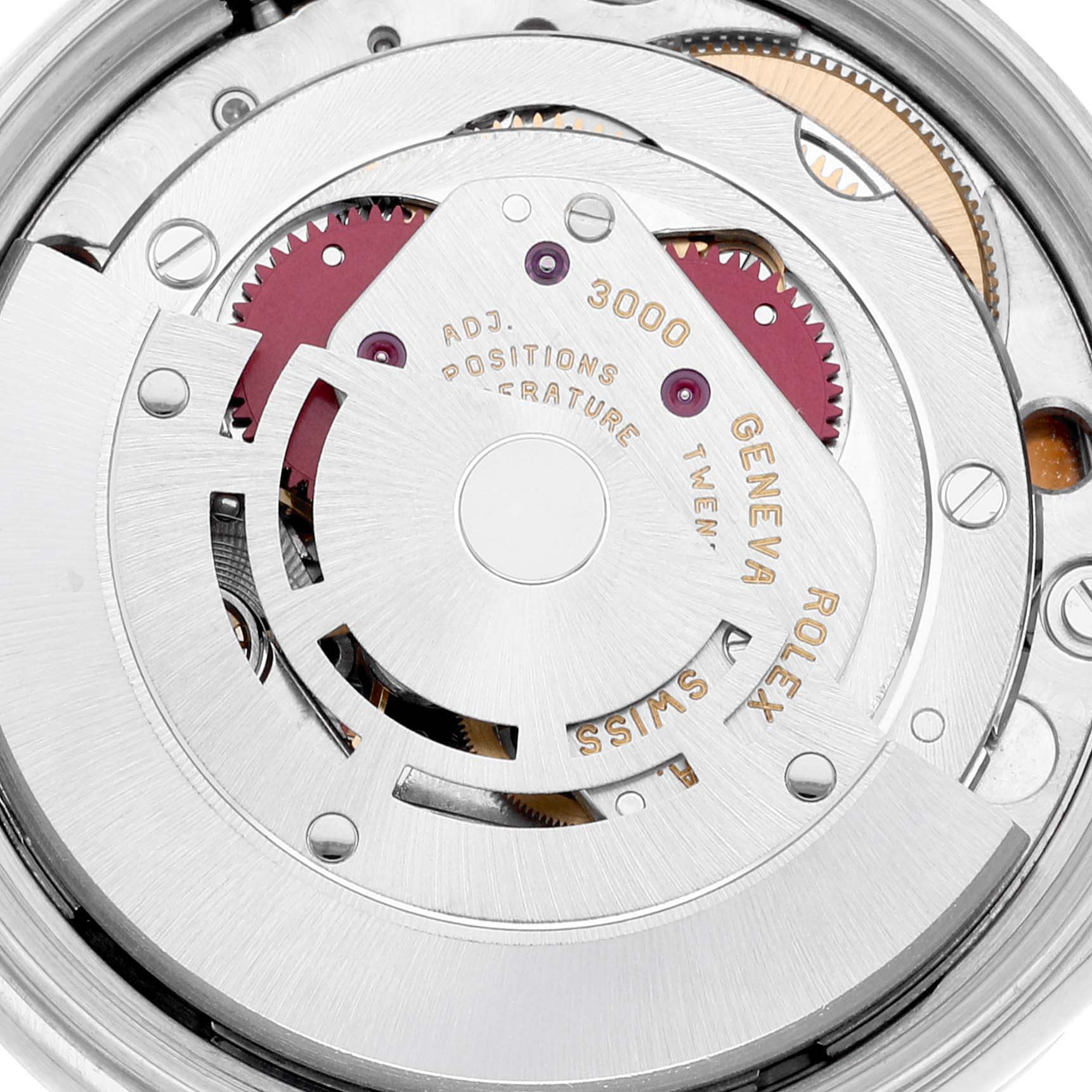 The image shows a close-up view of the movement inside a Rolex Air-King 14010 Men's Stainless Steel Silver Dial 14010 Men's Stainless Steel Silver Dial watch, highlighting gears and engravings.