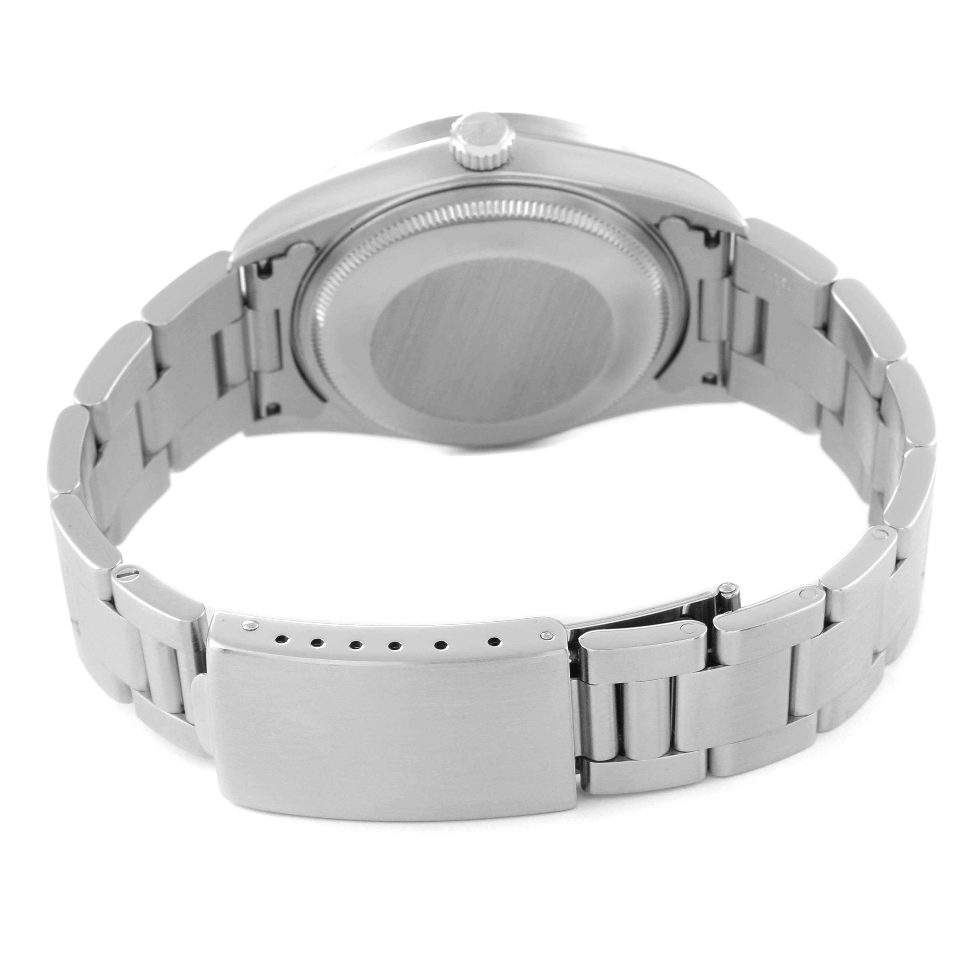 The image shows the backside of a Rolex Air-King 14010 Men's Stainless Steel Silver Dial 14010 Men's Stainless Steel Silver Dial watch, focusing on the case back and bracelet with clasp.