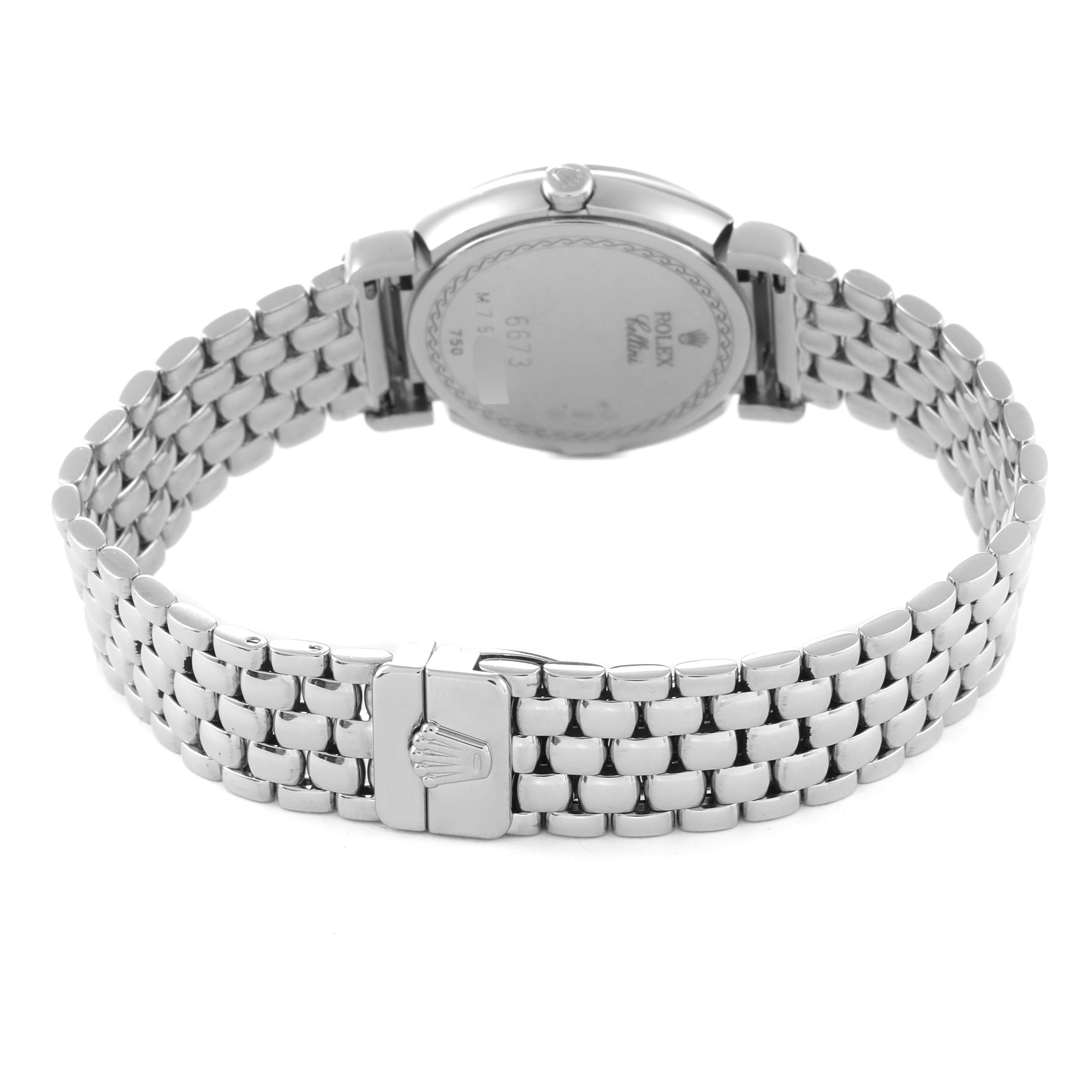 The image shows the back view of a Rolex Cellini 6673 Women's White Gold Silver Dial 6673 Women's White Gold Silver Dial watch, highlighting the stainless steel case, bracelet, and clasp.
