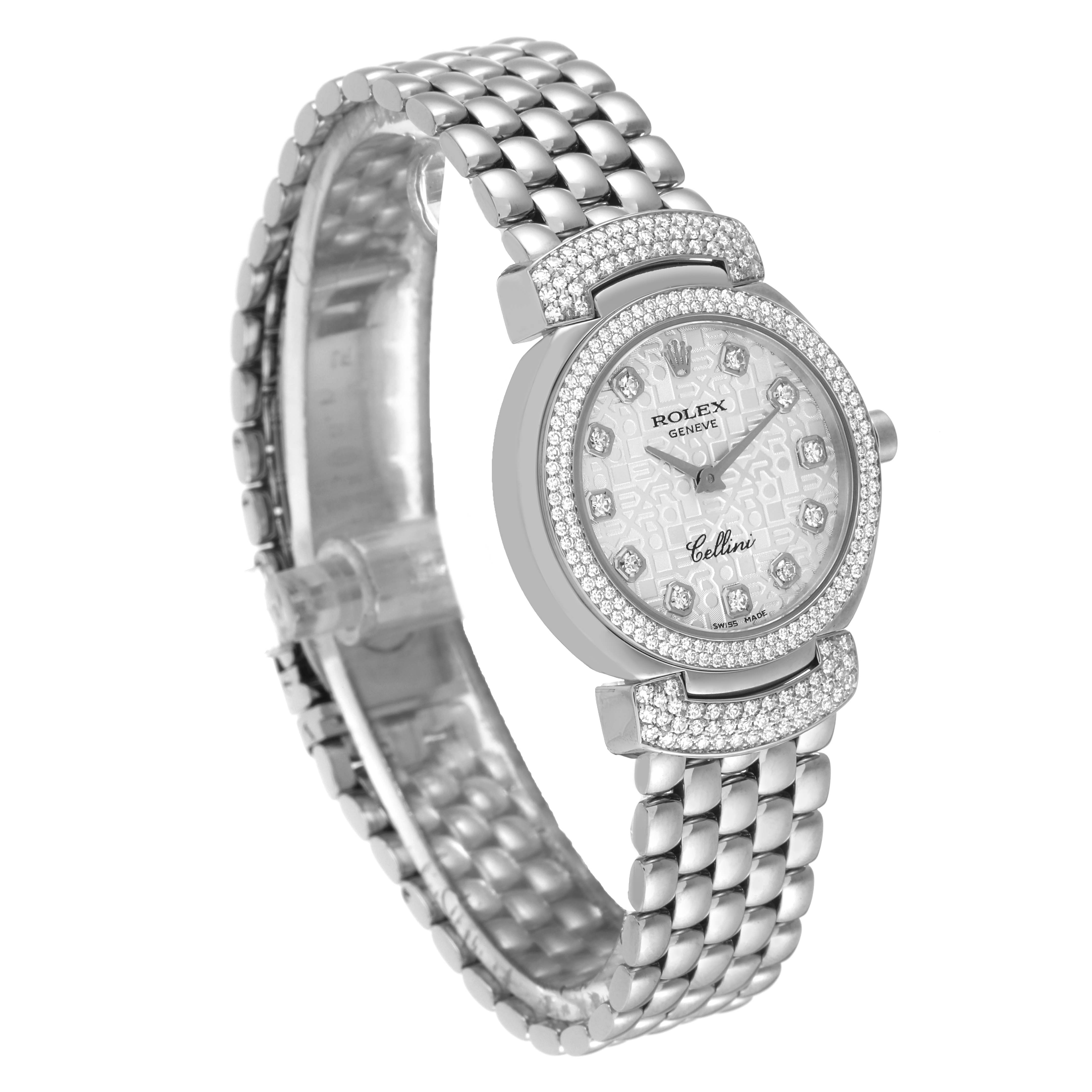 The Rolex Cellini 6673 Women's White Gold Silver Dial 6673 Women's White Gold Silver Dial watch is shown at an oblique angle, highlighting the face, bezel, and bracelet.