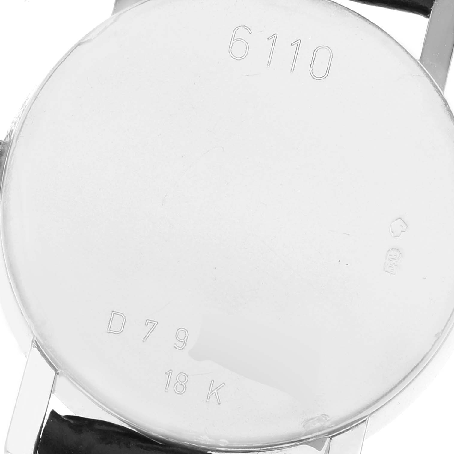 The image shows the back of the Rolex Cellini 6110 Women's White Gold Mother of Pearl Dial 6110 Women's White Gold Mother of Pearl Dial watch, highlighting its case back details and engravings.