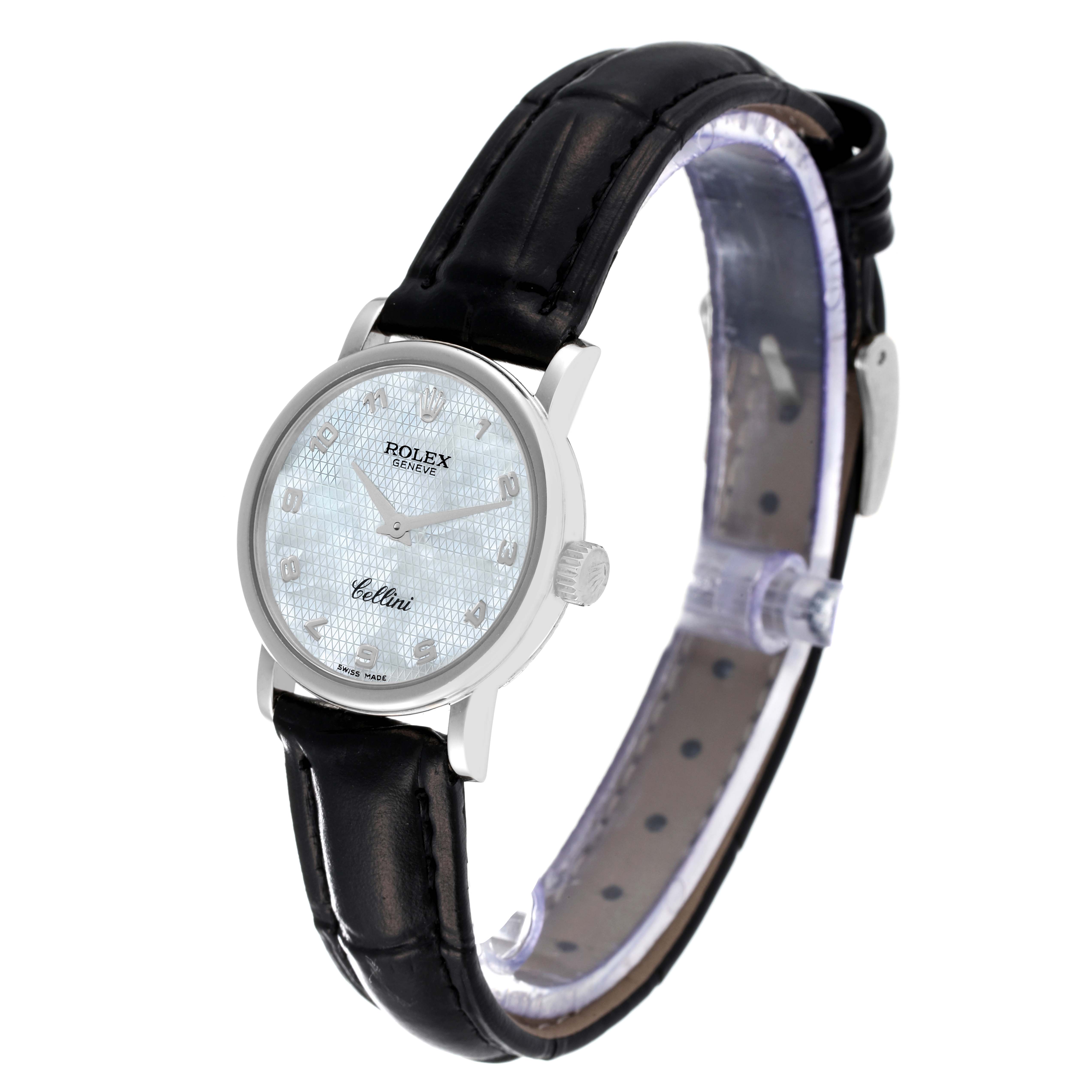 The image shows a Rolex Cellini 6110 Women's White Gold Mother of Pearl Dial 6110 Women's White Gold Mother of Pearl Dial watch from a front-left angle, highlighting its dial, case, and leather strap.