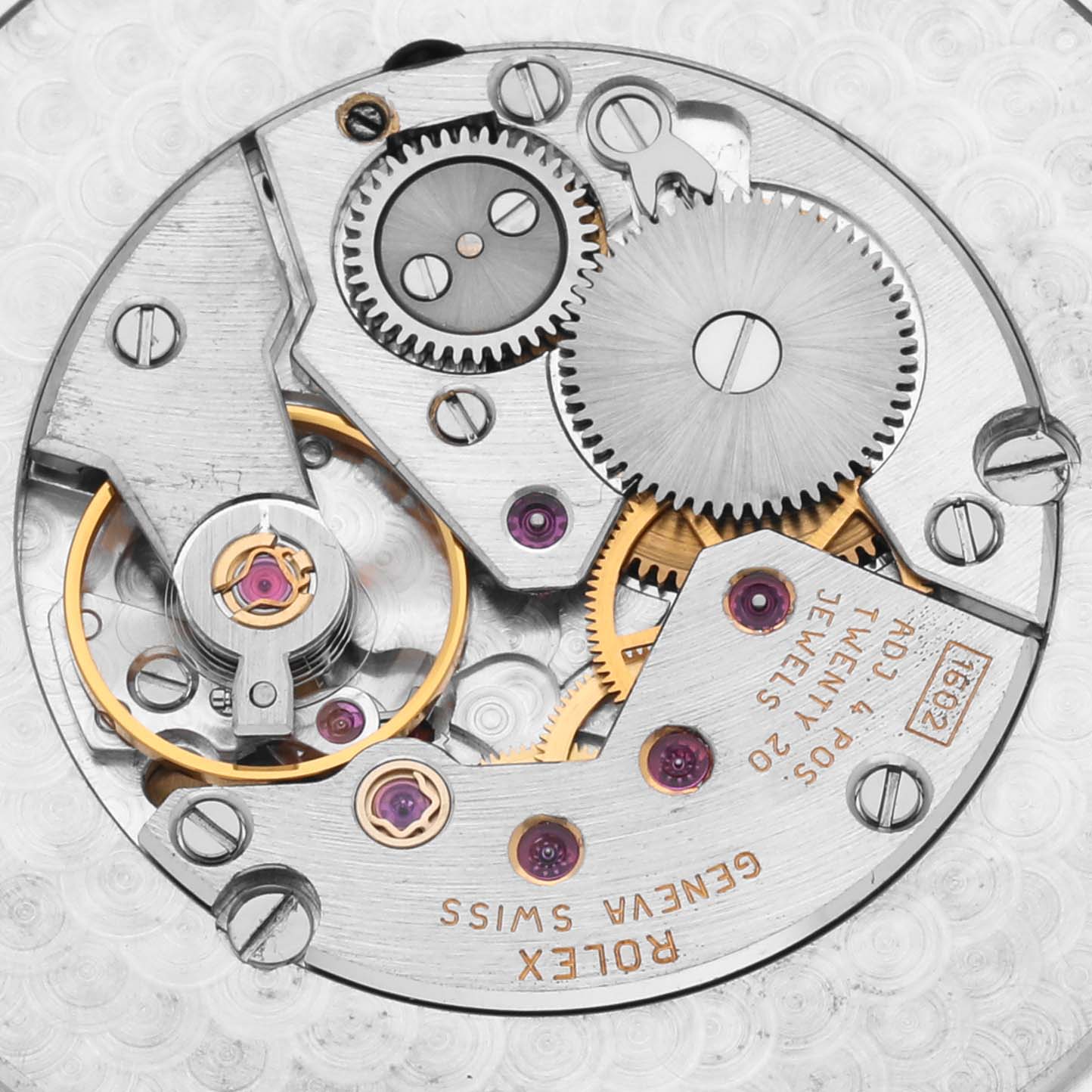 This is a top-down view of the Rolex Cellini 4243 Men's White Gold White Dial 4243 Men's White Gold White Dial watch's internal movement mechanism, showing gears and other components.