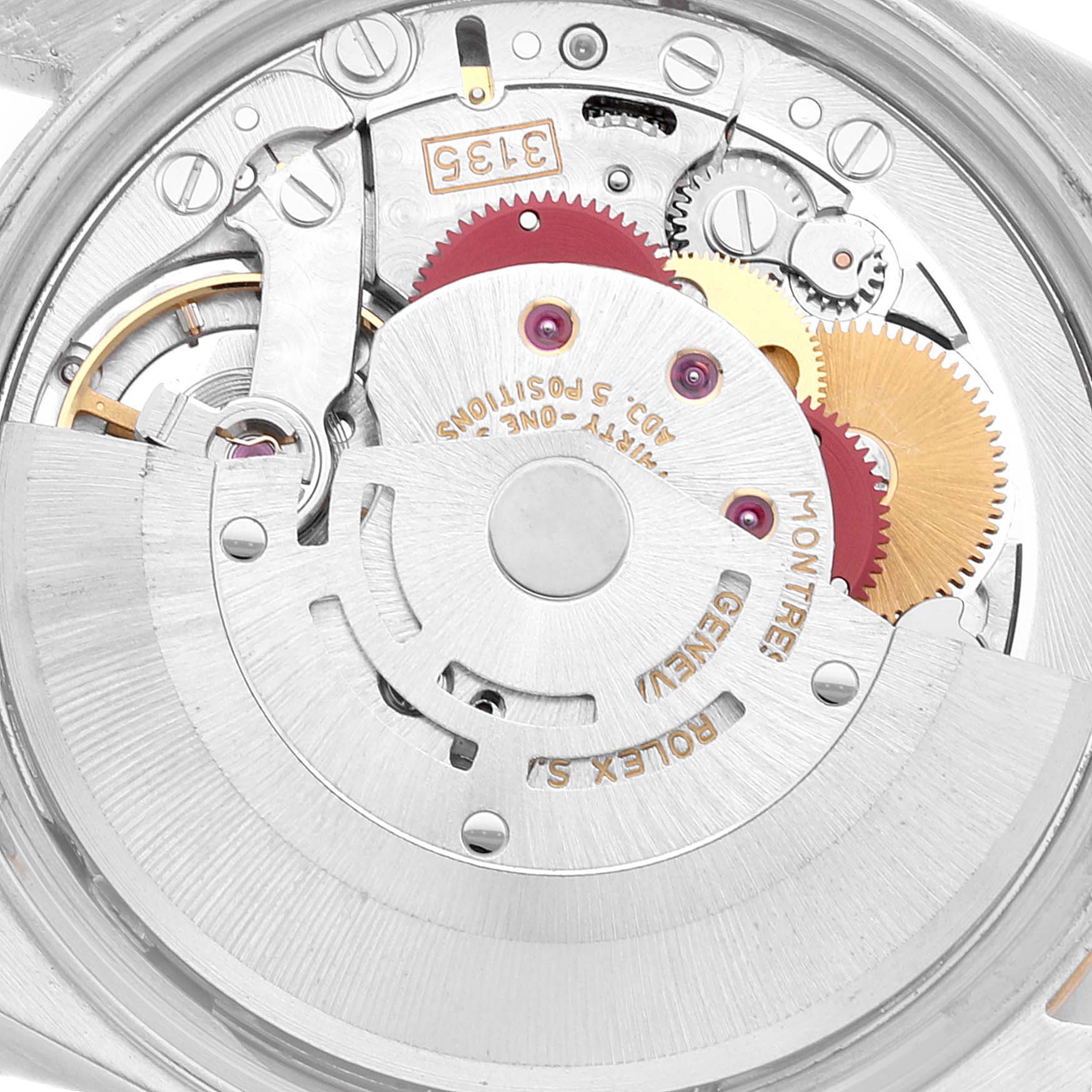 This image shows the intricate internal mechanics of a Rolex Date 15223 Men's Steel and Gold (two tone) White Dial 15223 Men's Steel and Gold (two tone) White Dial model watch, highlighting gears and movement components.