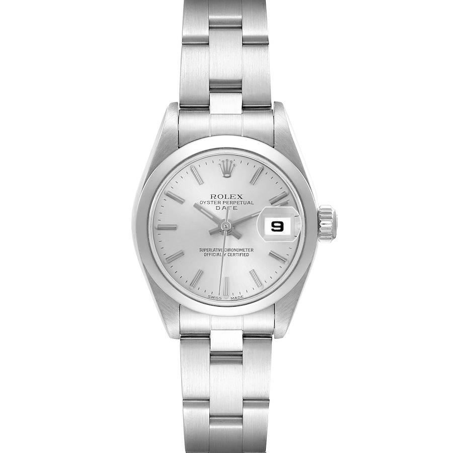 The Rolex Date model watch is shown from a top-down angle, displaying the dial, bracelet, and date magnifier.