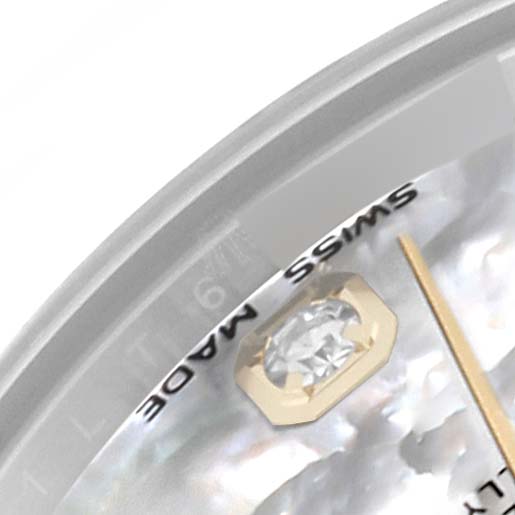The close-up angle shows the dial of a Mid-Size Rolex watch, featuring a diamond hour marker and the "SWISS MADE" text.