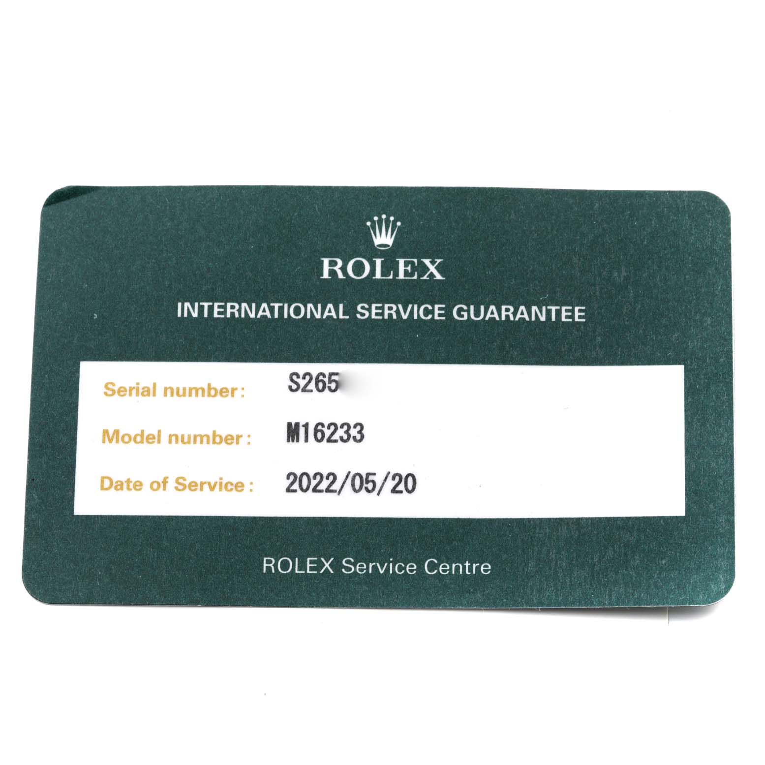 This image shows a Rolex Datejust 16233 Men's Steel and Gold (two tone) Silver Dial 16233 Men's Steel and Gold (two tone) Silver Dial model M16233 service guarantee card with serial number S265.