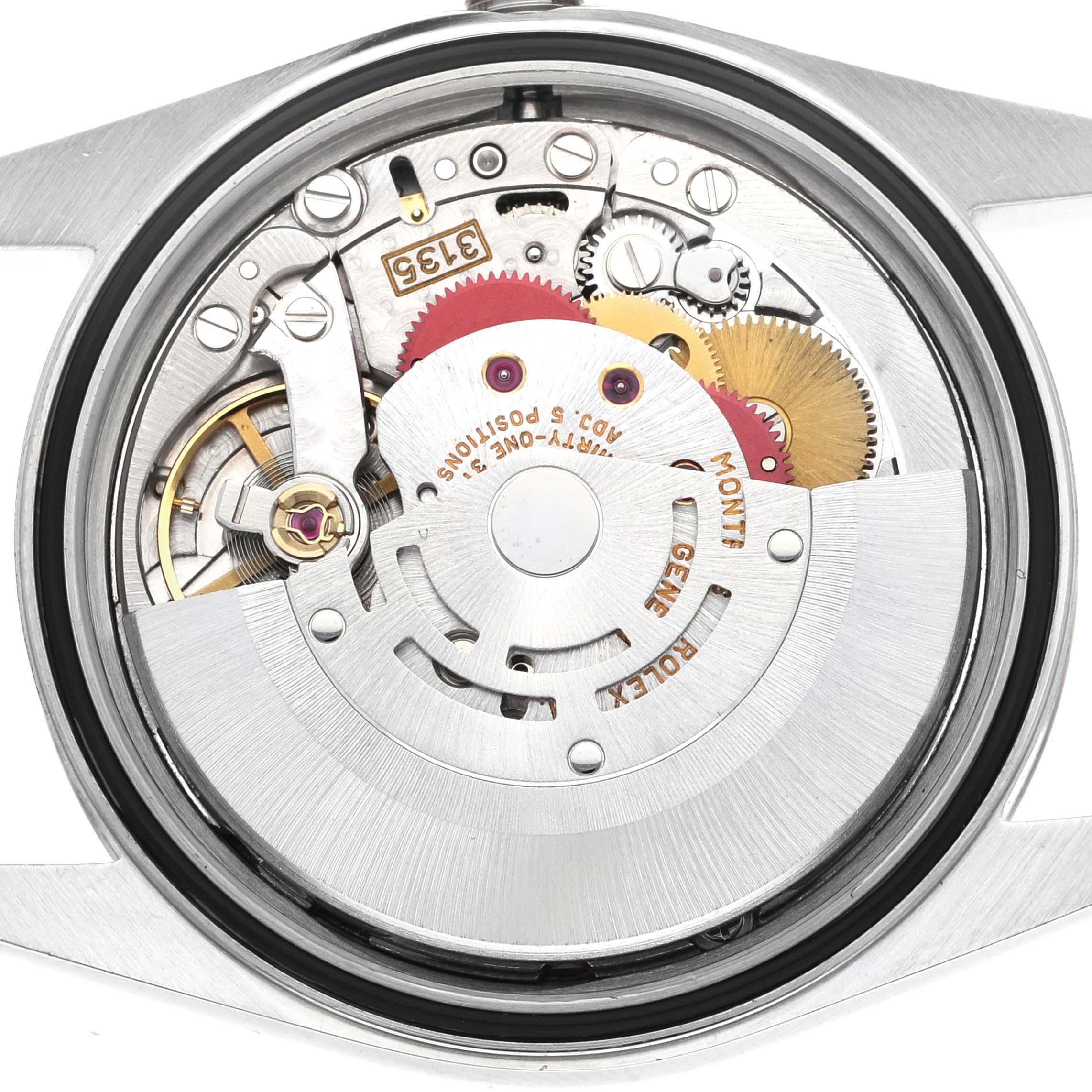 The image shows an internal view of the Rolex Datejust 16233 Men's Steel and Gold (two tone) Silver Dial 16233 Men's Steel and Gold (two tone) Silver Dial watch, highlighting its movement and mechanical components.