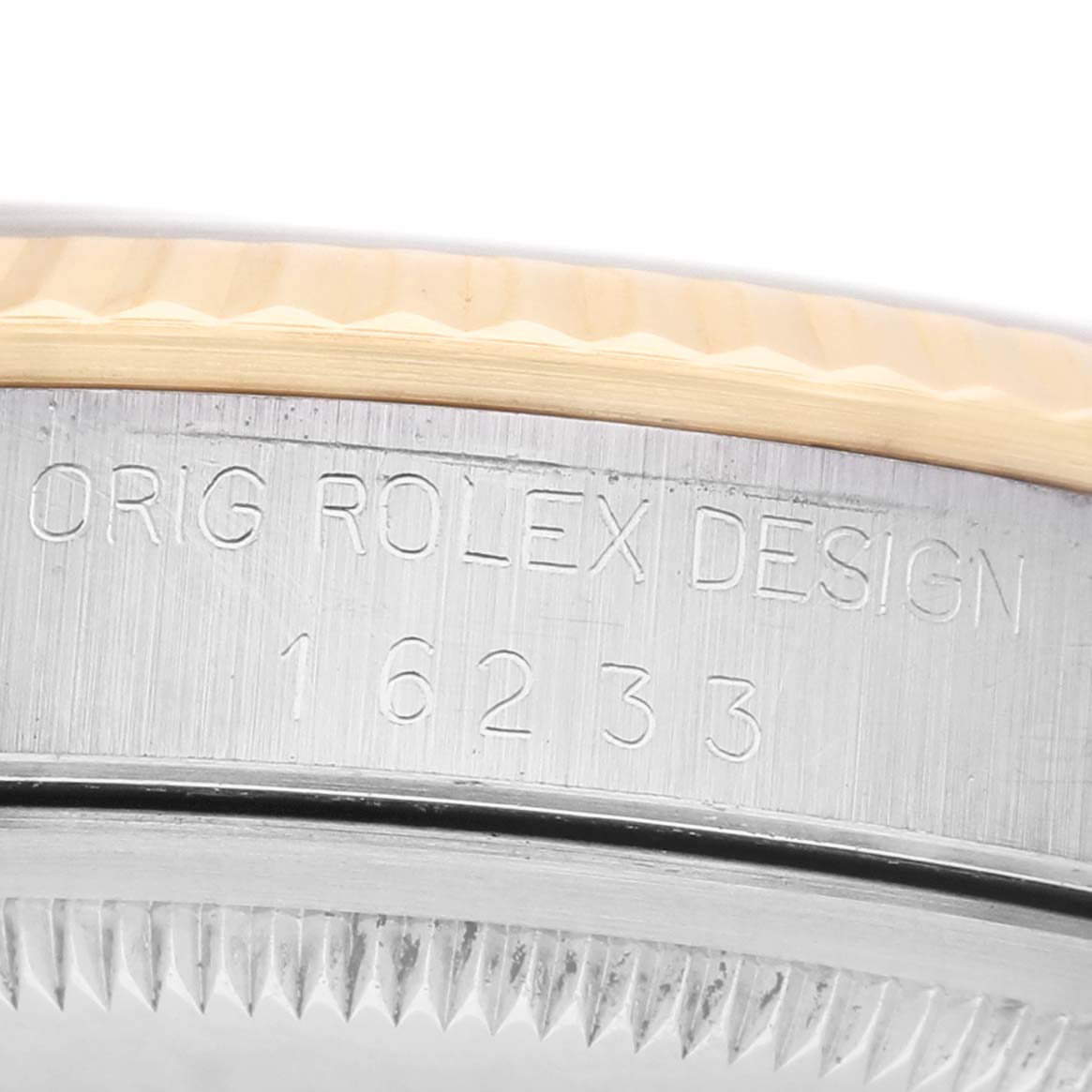 The image shows a close-up of the case side and bezel edge of a Rolex Datejust 16233 Men's Steel and Gold (two tone) White Dial, highlighting the model number engraving.