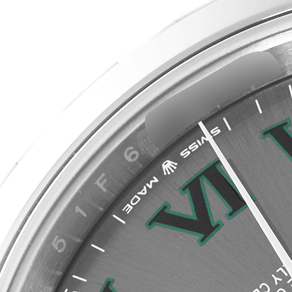 The image shows a close-up of the dial and bezel of a Rolex Datejust 41 126300 Men's Stainless Steel Grey Dial 126300 Men's Stainless Steel Grey Dial, highlighting the "Swiss Made" text and part of the Roman numeral VI.