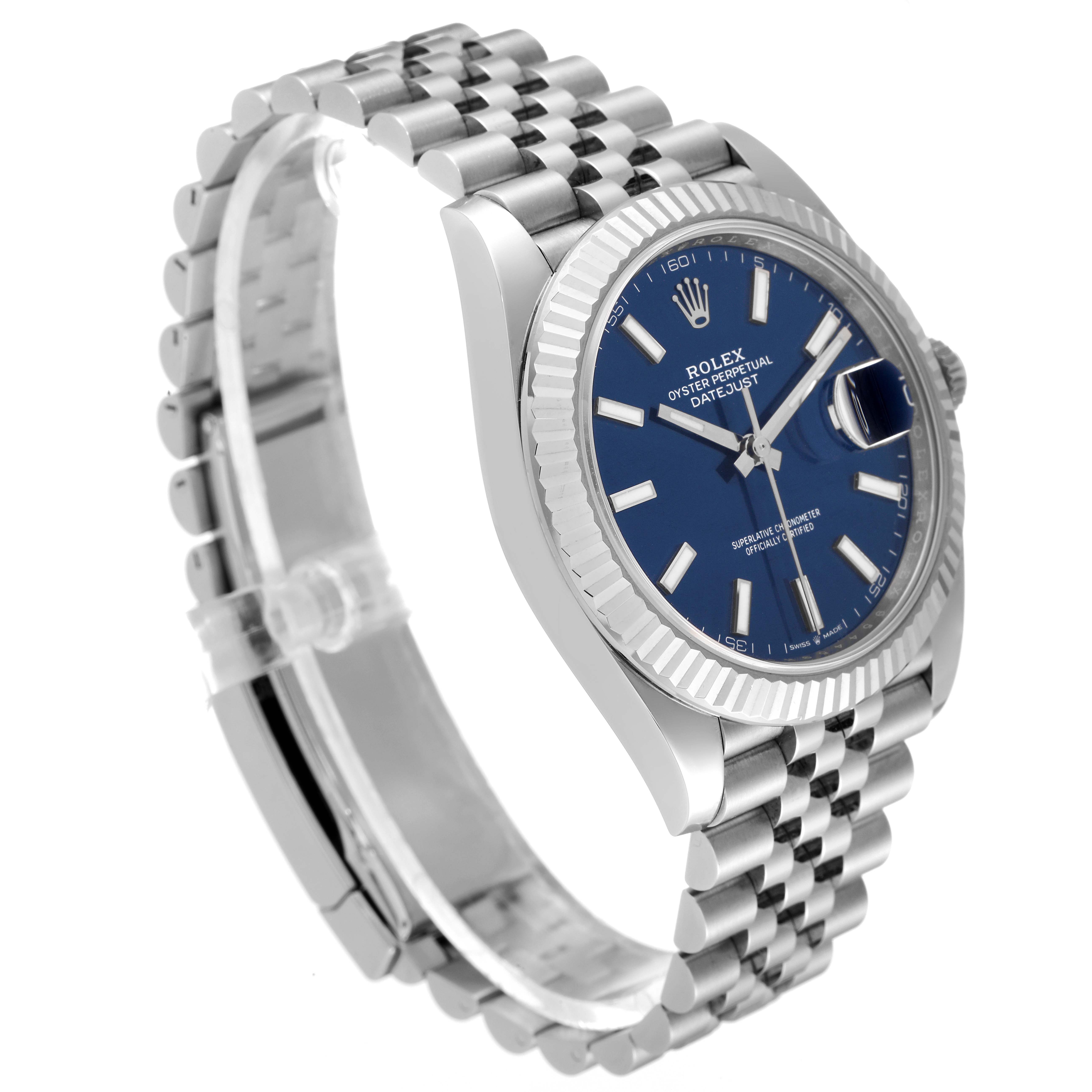 The Rolex Datejust 41 126334 Men
s Stainless Steel Blue Dial 126334 Men
s Stainless Steel Blue Dial watch is shown at an angle displaying the blue dial, fluted bezel, and Jubilee bracelet.