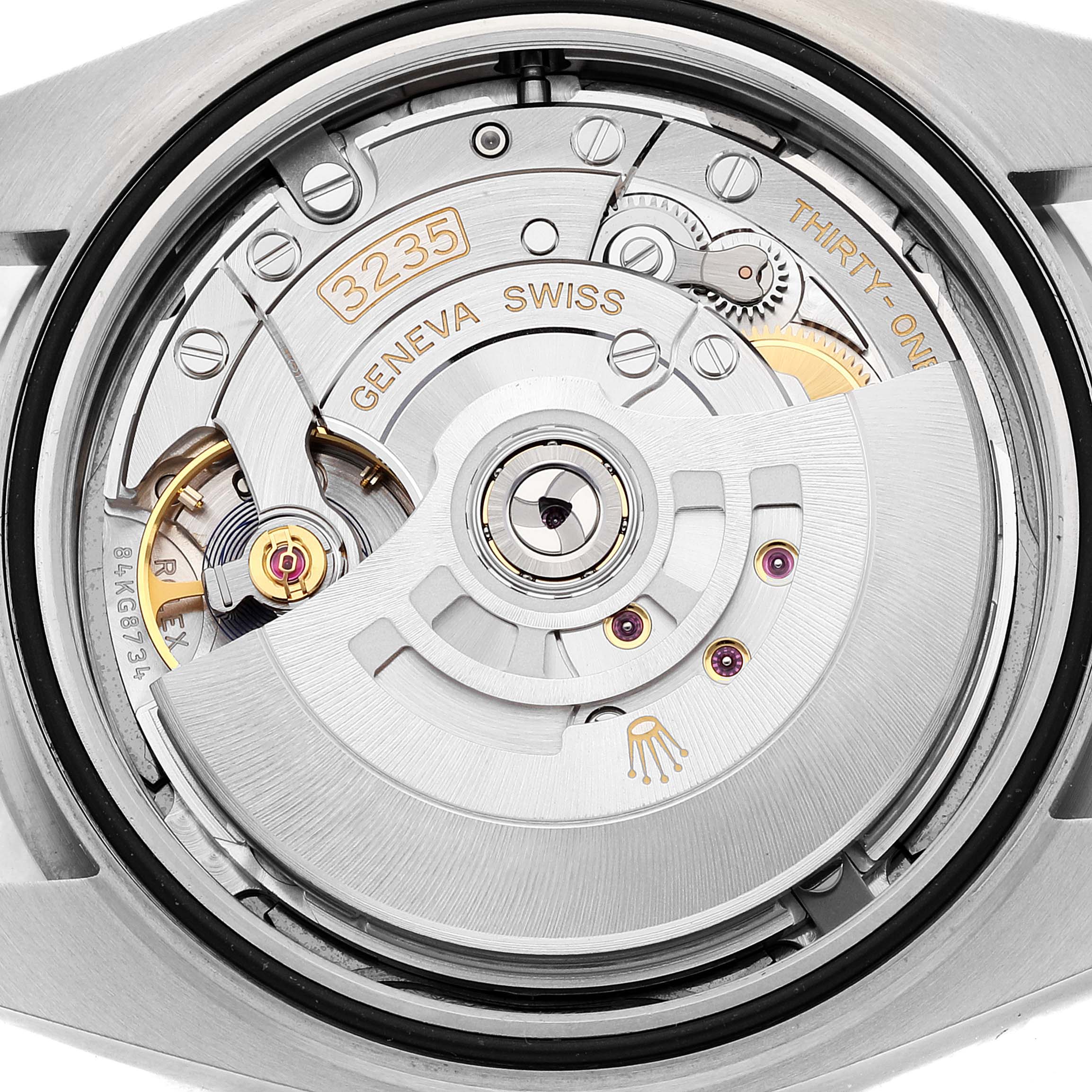 This image shows a detailed view of the movement mechanism inside a Datejust 41 Rolex watch.
