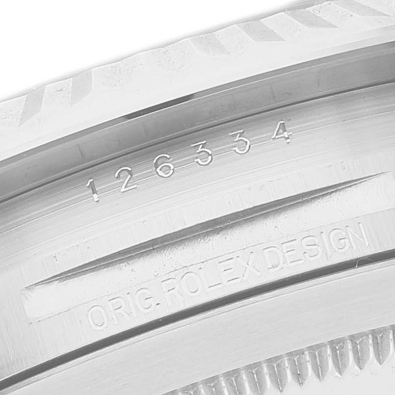 The image shows a close-up of the caseback and inner bezel of a Rolex Datejust 41 126334 Men
s Stainless Steel Blue Dial 126334 Men
s Stainless Steel Blue Dial, featuring the model number 126334 and "ORIG. ROLEX DESIGN" engraving.