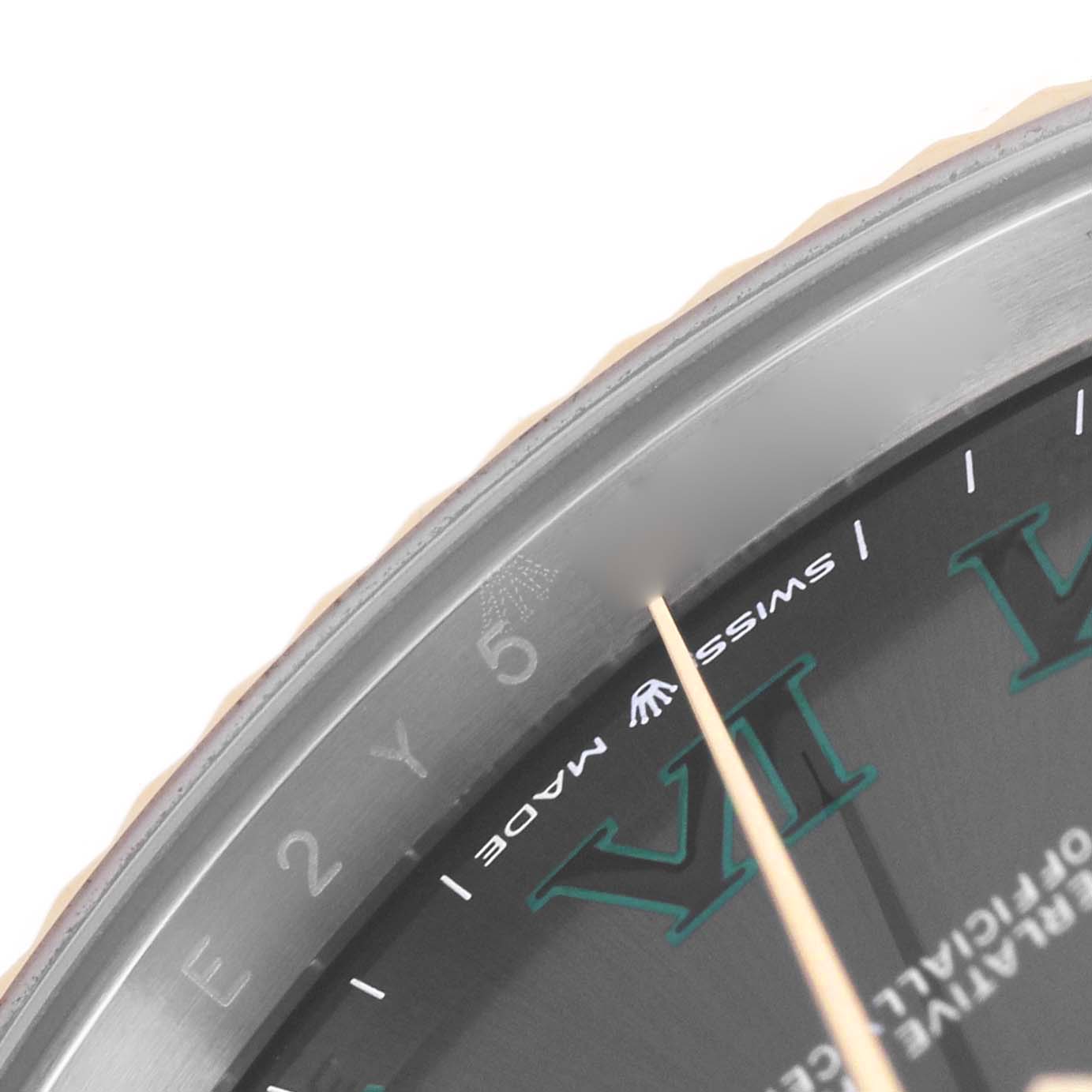 The image shows a close-up of the dial's edge and inner bezel of a Rolex Datejust 41 126333 Men's Steel and Gold (two tone) Grey Dial, highlighting the "SWISS MADE" text.