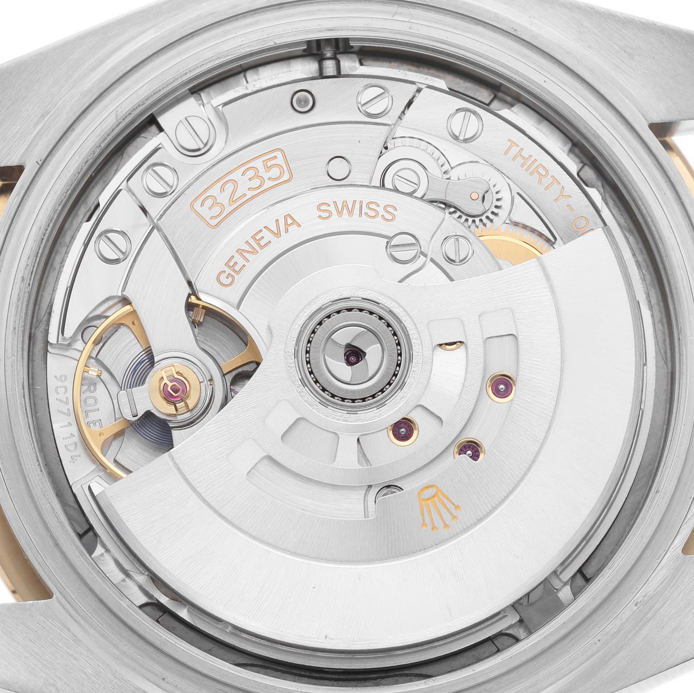 The image shows the movement and internal mechanics of the Rolex Datejust 41 126333 Men's Steel and Gold (two tone) Grey Dial model from a rear angle.