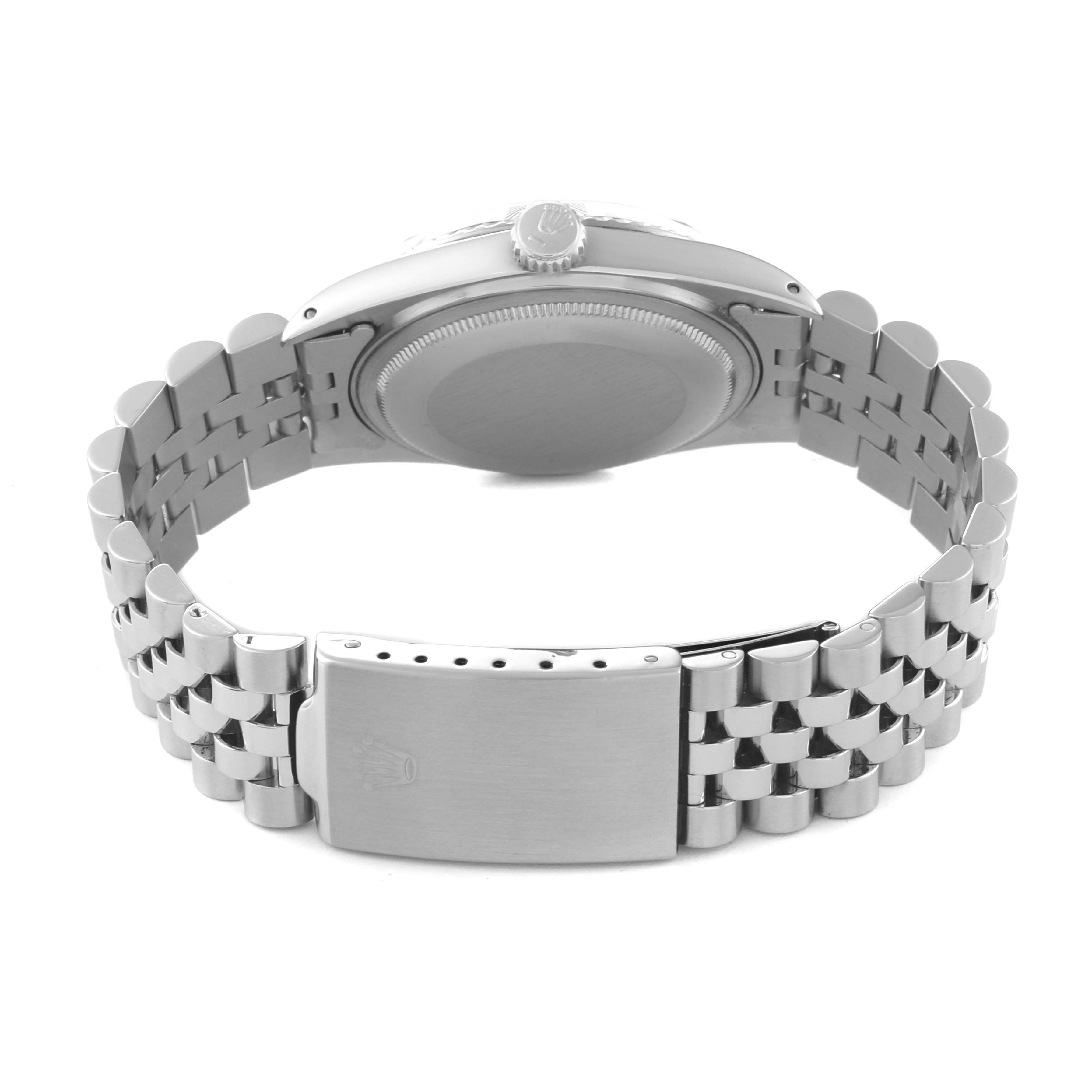 The image shows the back of the Vintage Collection model by Rolex, highlighting the bracelet, clasp, case back, and crown.