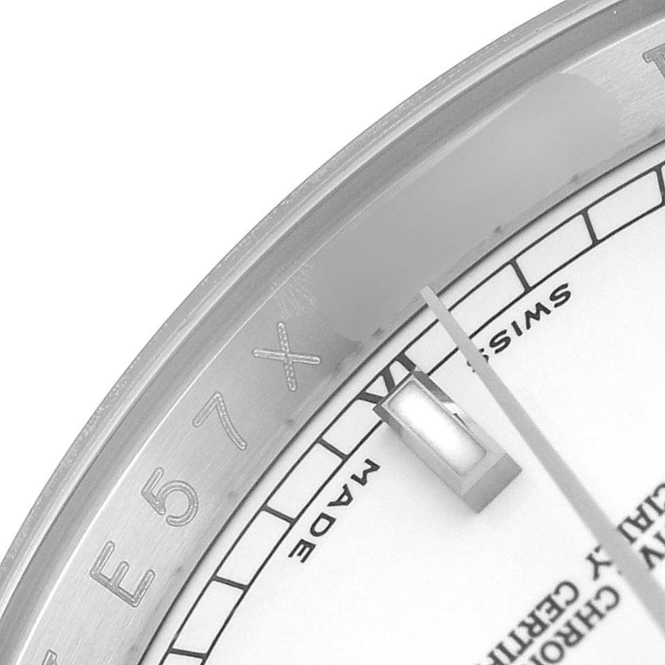 The image shows a close-up of the dial and hour marker of a Rolex Datejust 116200 Men's Stainless Steel White Dial, featuring part of the bezel and the "Swiss Made" text.