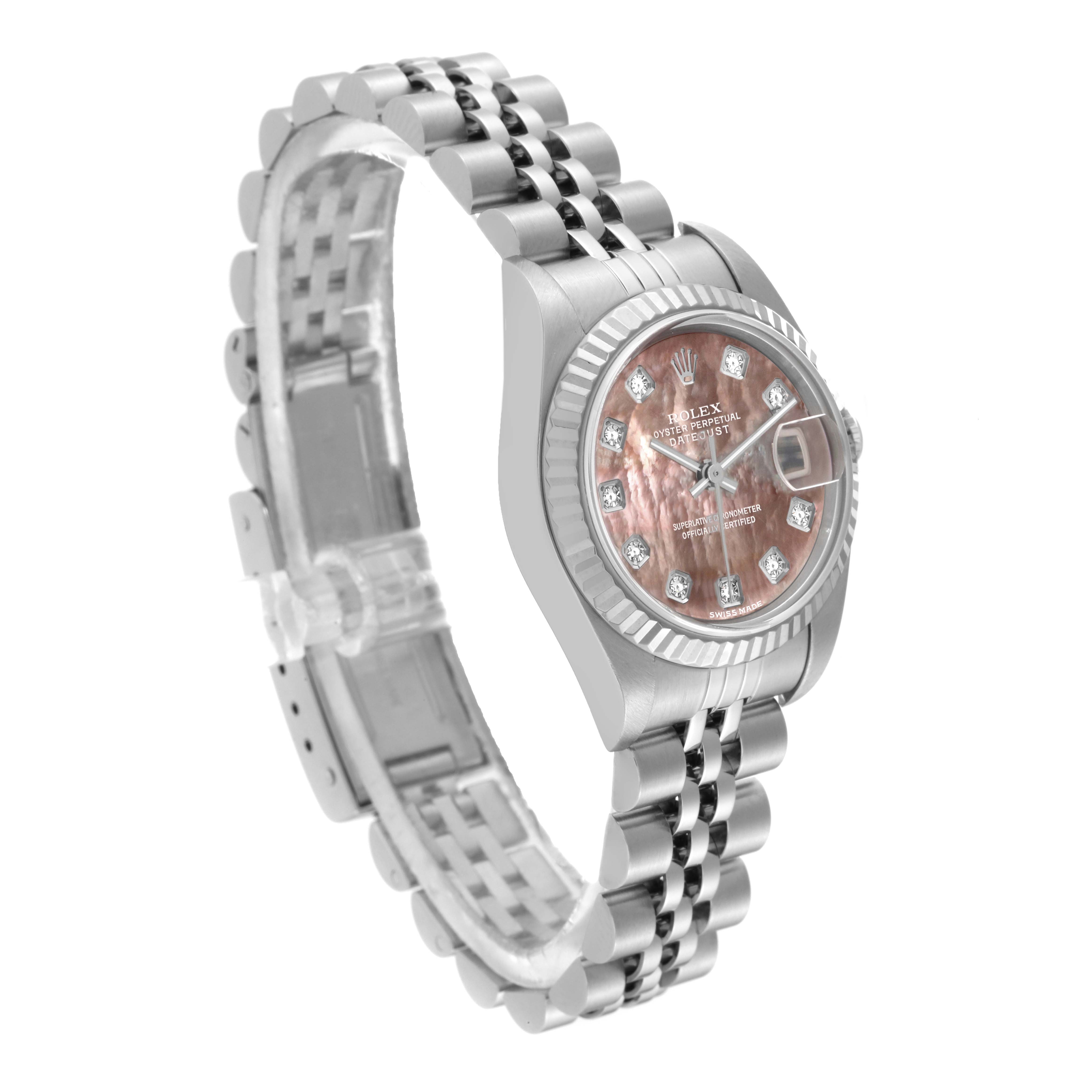 The Rolex Datejust 79174 Women's Stainless Steel Mother of Pearl Dial 79174 Women's Stainless Steel Mother of Pearl Dial watch is shown at an oblique angle, showcasing the face, bezel, and bracelet.