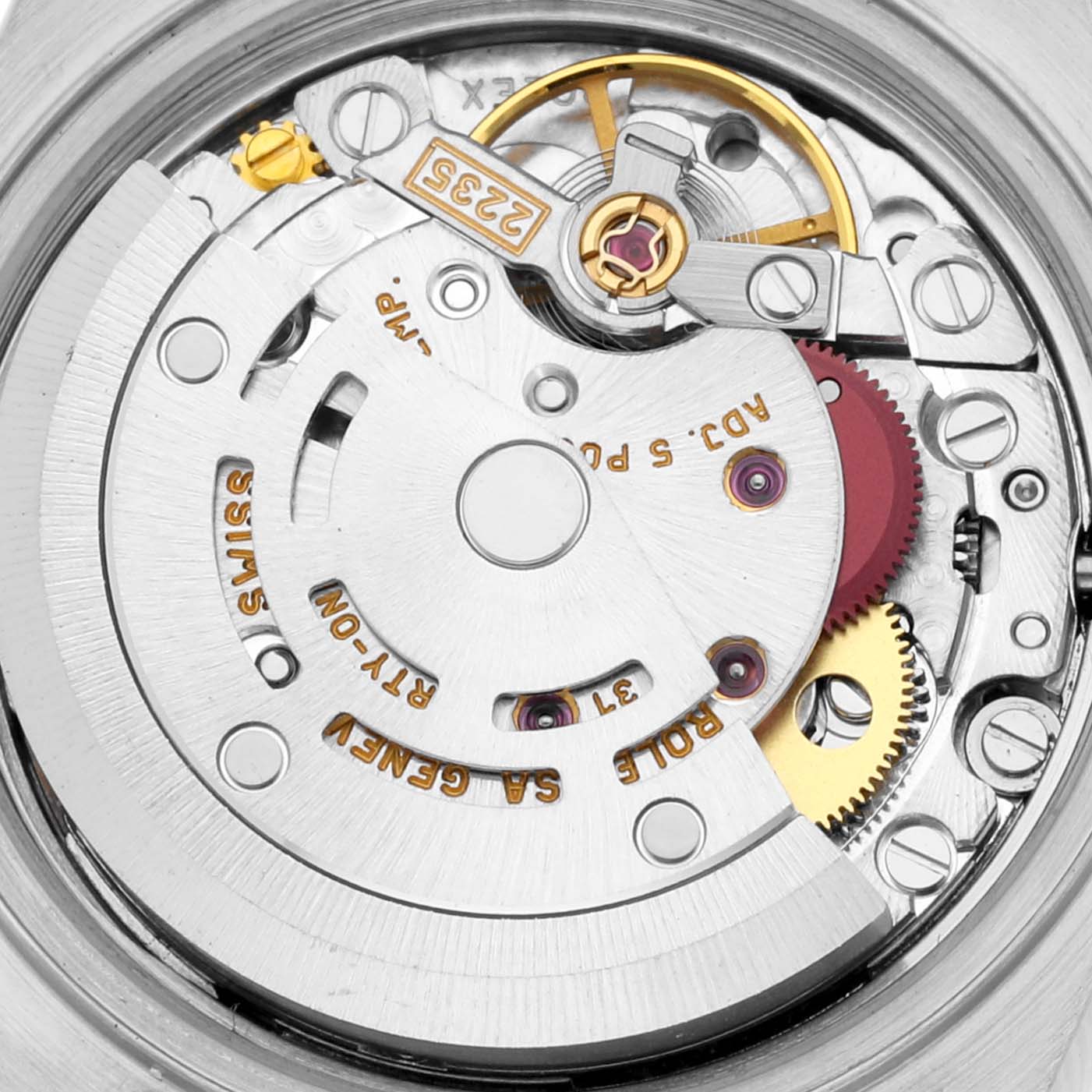 This close-up shot of a Rolex Datejust 79174 Women's Stainless Steel Mother of Pearl Dial 79174 Women's Stainless Steel Mother of Pearl Dial model shows the intricate details of its internal watch movement.