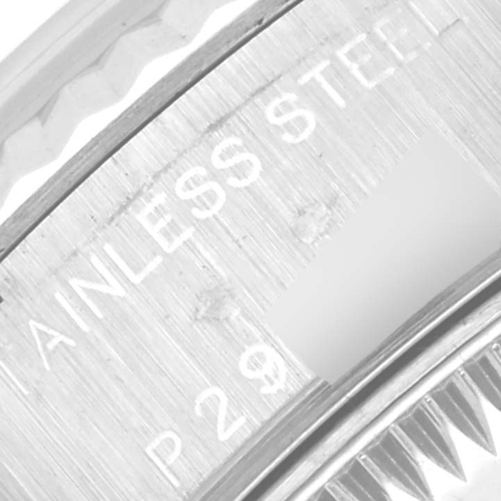 This close-up image shows the side engraving on the case of a Rolex Datejust 79174 Women's Stainless Steel Mother of Pearl Dial 79174 Women's Stainless Steel Mother of Pearl Dial stainless steel watch.